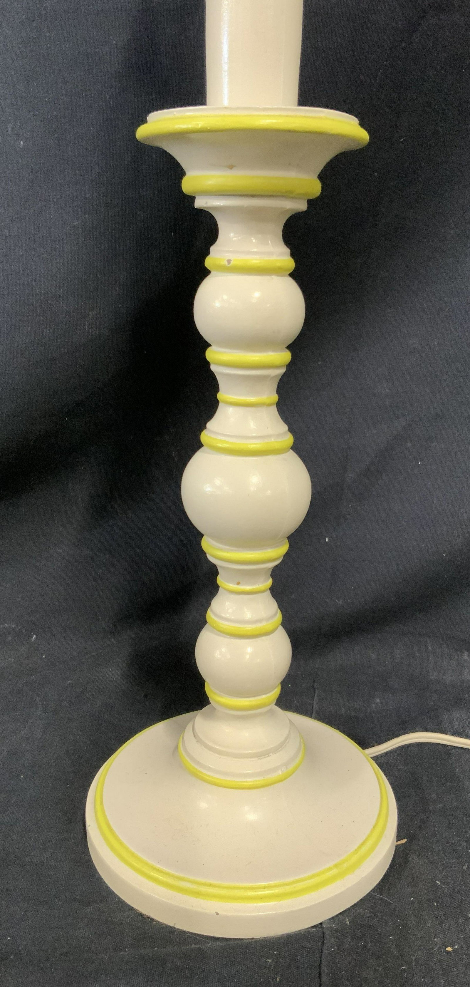Vintage Tabletop Lamp: Vintage table top lamp. Cream and pasted yellow tones color the turned body. Lamp shade included. Ensures approx 23 inches H, and 12 inches W with lamp shade attached. Wear is consistent with age and 