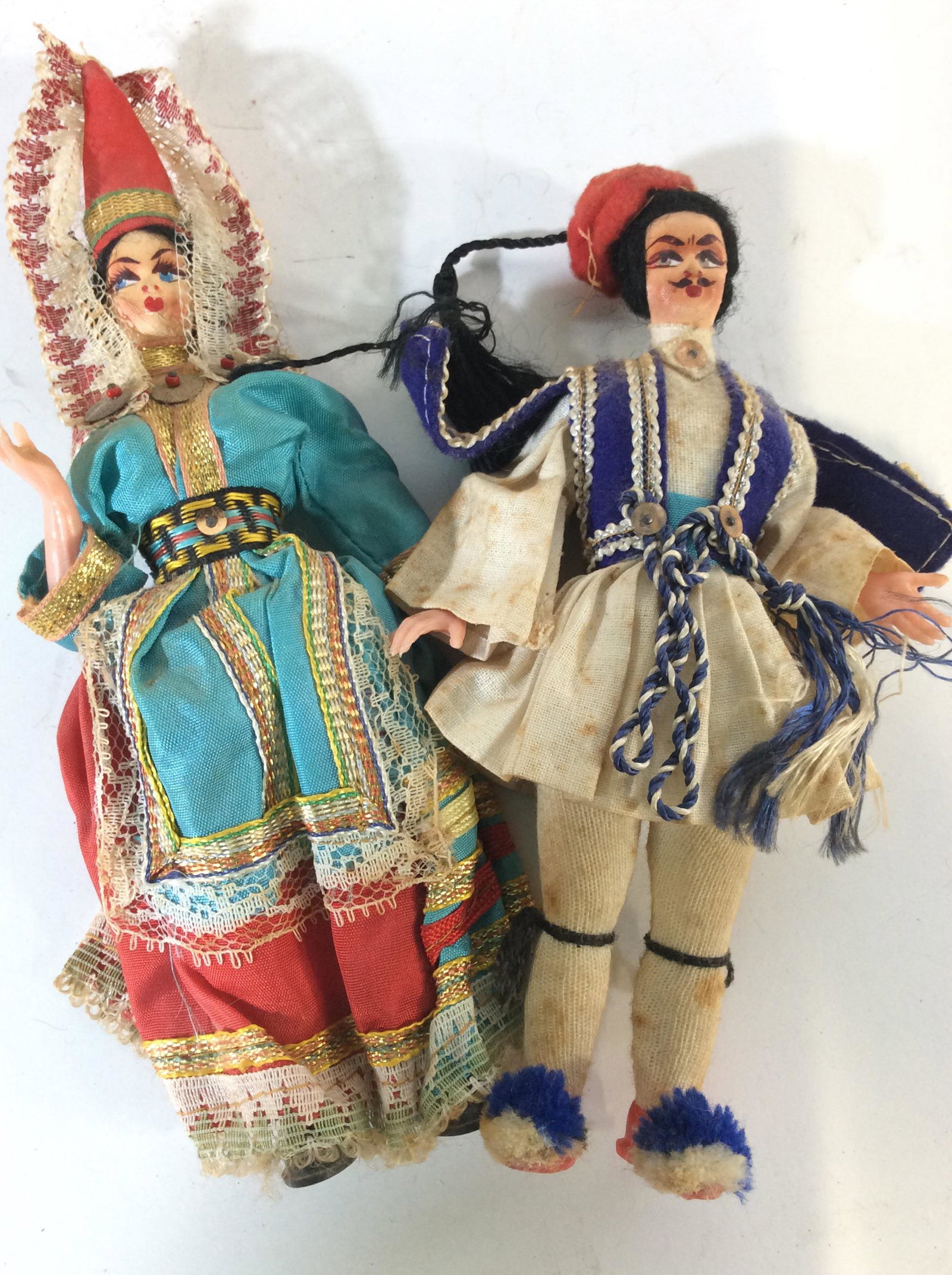 Lot 7 Collectible Mid Century Dutch Dolls: Vintage Dolls, c. 1960s possibly, traditional costuming, Dutch Girl And Boy in Org Plastic Container, Dutch Farm Girls, Scottish Soldier, And Hungarian/ Prussian/ Indian Style Prince & Princess Dolls,