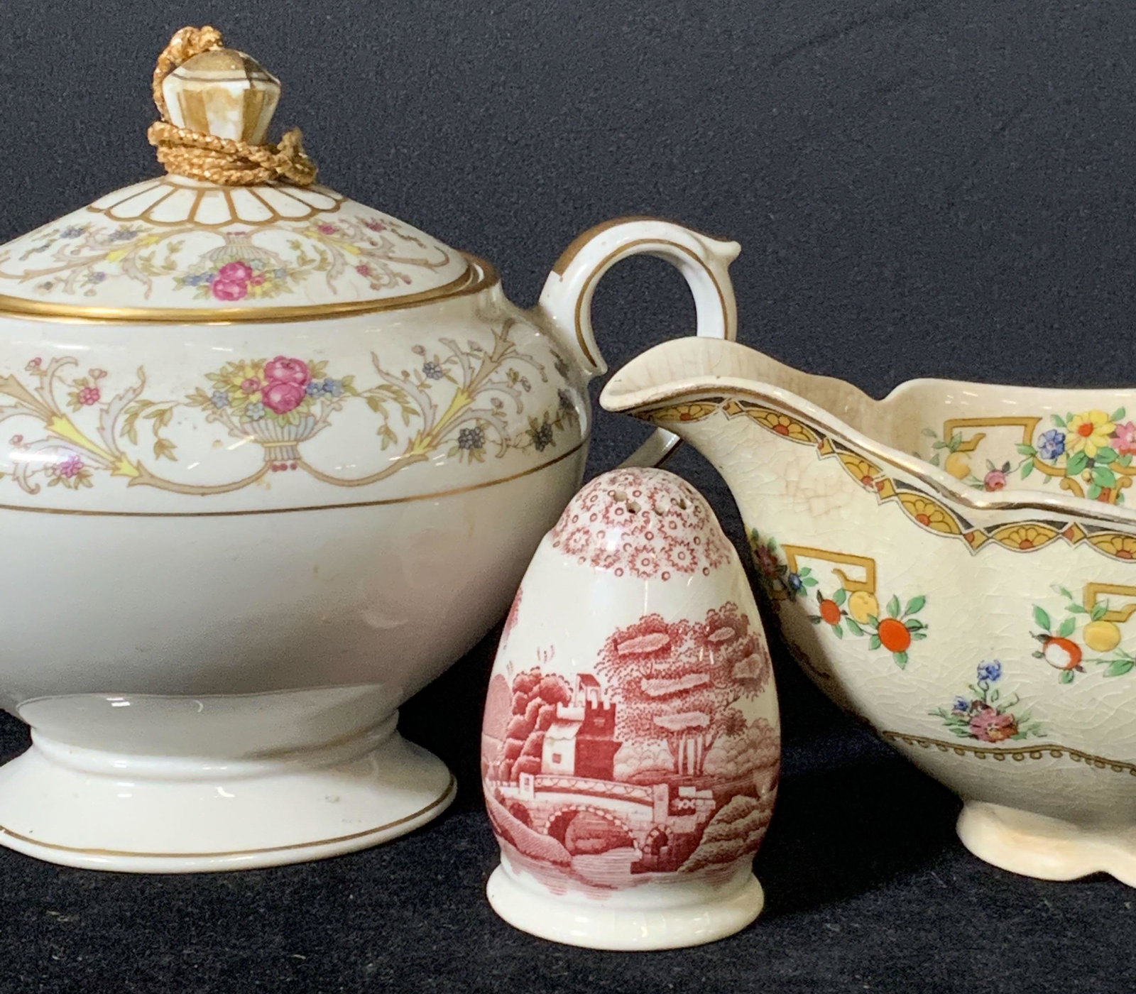 Lot 3 Signed Vintage Porcelain Footed Vessels: Lot of 3 porcelain kitchenware items. Each signed on underside. Pepper shaker is red & white, design depicts natural environmental and houses. Still filled w/ pepper. Signed Underside reads: Spodes To