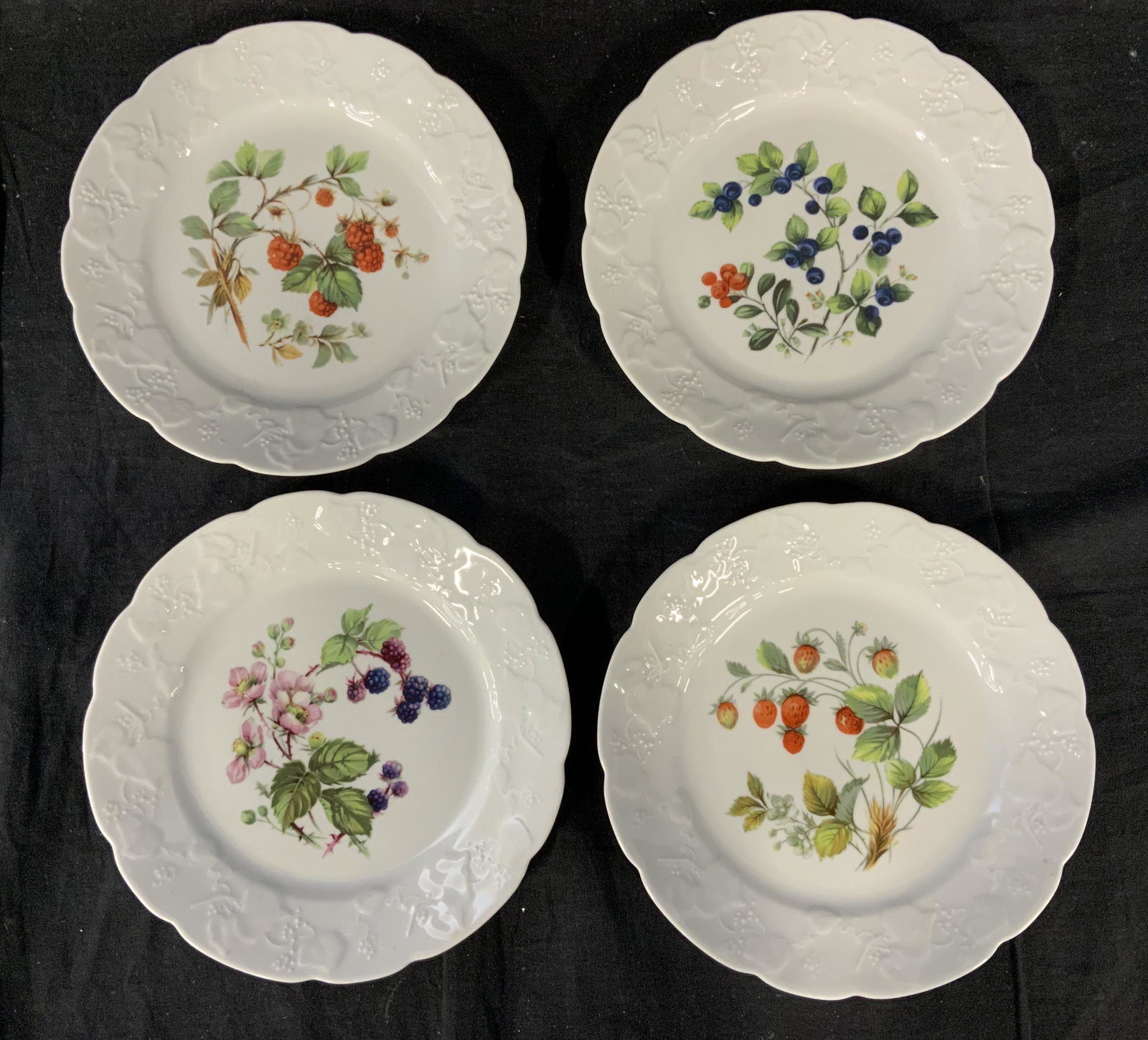 Lot 4 Dansk Ceramic Plates: Lot 4 Dansk Ceramic Plates, stamp to base reads ‘Dansk International Designs Ltd France Microwave safe’, plates with various fruit designs and embossed pattern around rim, all measure 8 1/8 inches