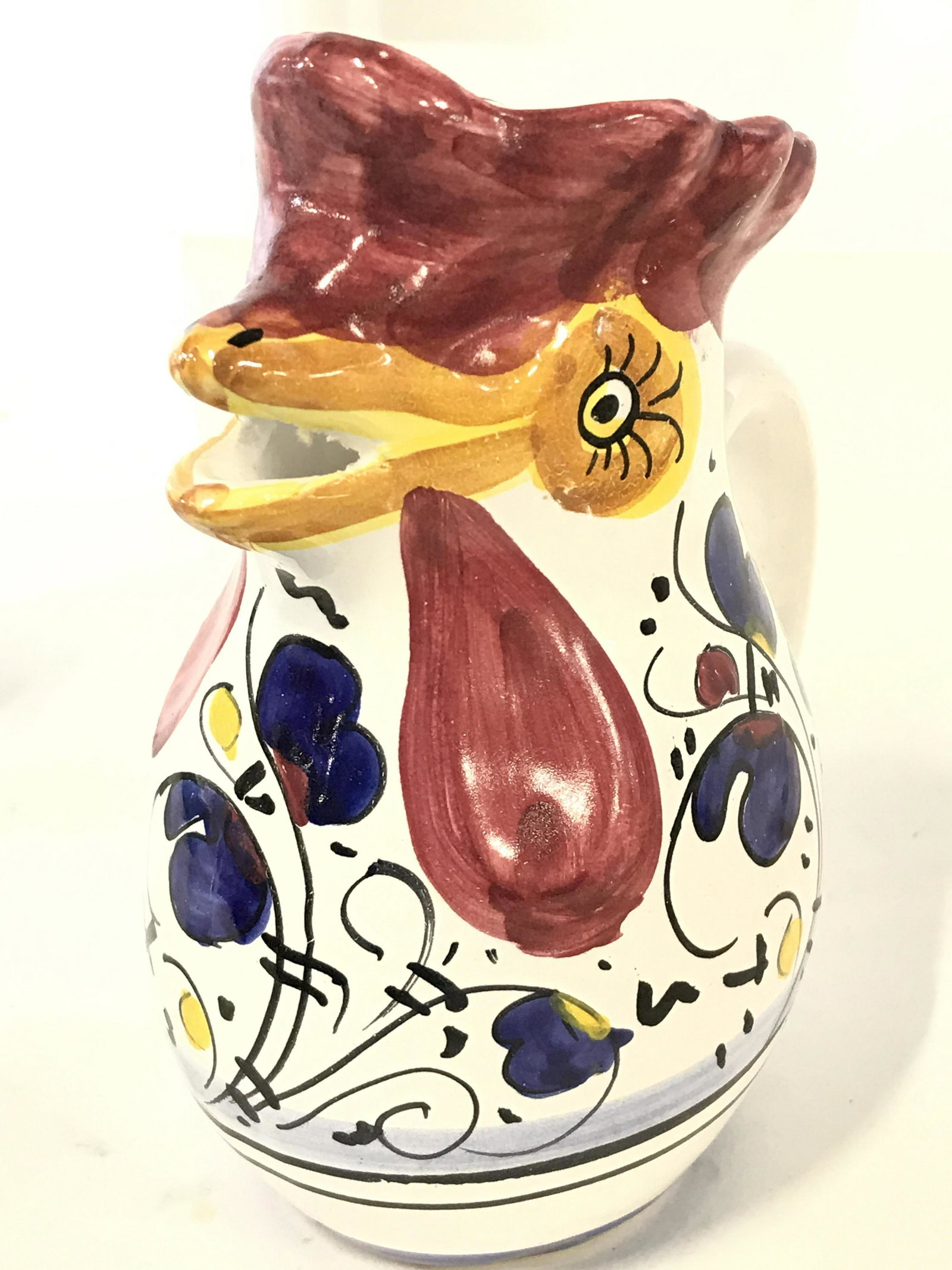 Lot 3 Collectible Ceramic Deruta Kitchenware: Hand Painted Collectible Blue & White chicken figural decor, Signed hand Painted Deruta Chicken Pitcher/ creamer, signed Made In Italy, Il Bargello , 6.5 in Ht, 5.5 in total width. White ceramic pecki