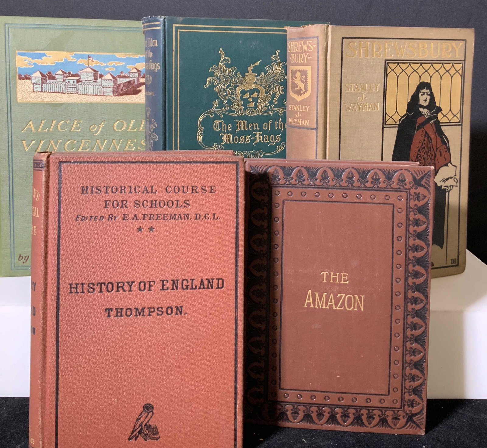 Lot 5 Antique Hardcover Books: Assortment (5) of books written by various authors. Titles include: Shrewsbury, The Amazon, Alice of Old Vincennes, & more. Some books signed by Caroline Drew. Authors include: Maurice Thompson, S.R C