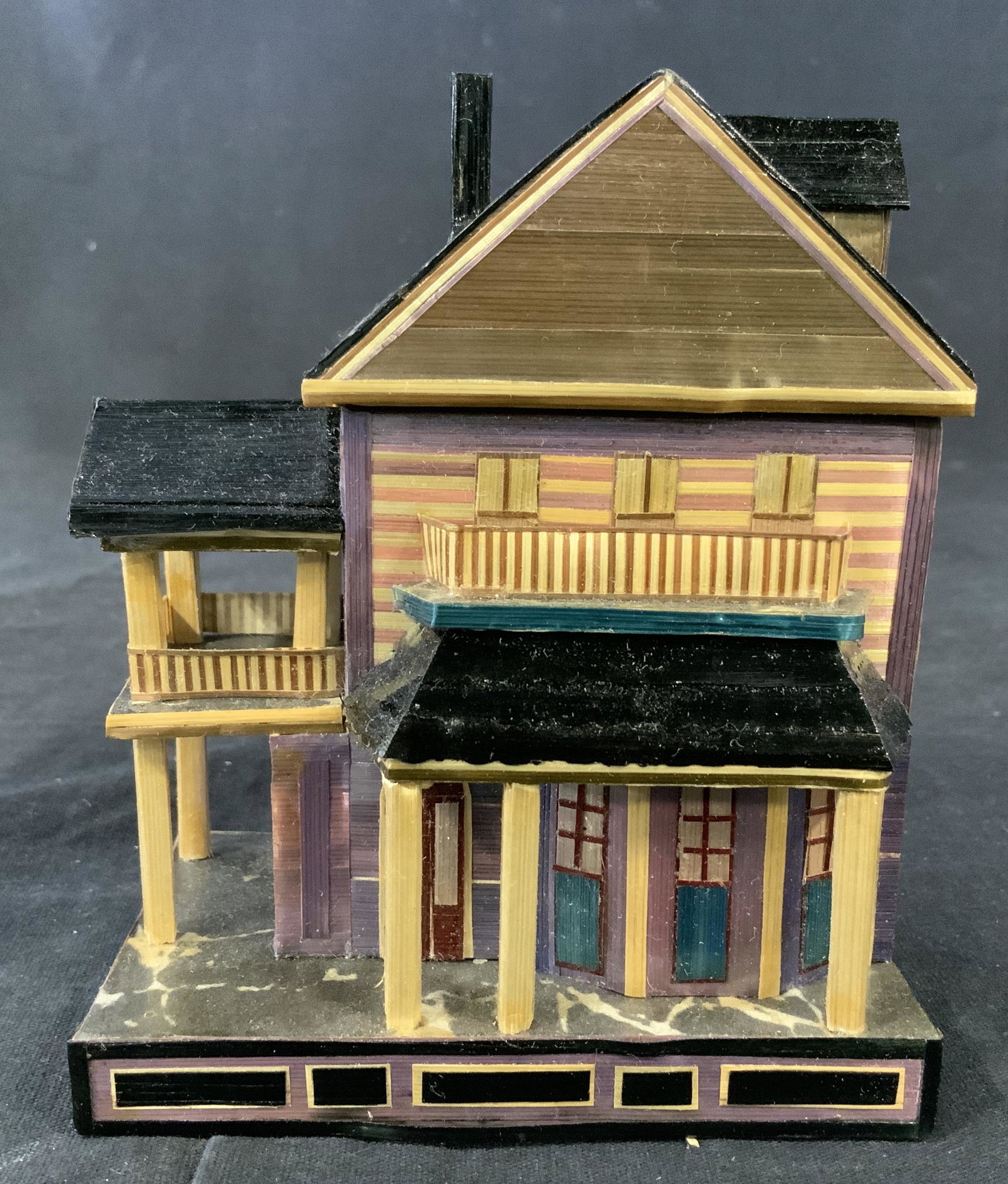 House Shaped Trinket Box: House Shaped Trinket Box, inscription reads ‘C’, comprised of colored dried straw, measures 4 3/4 x 3 7/8 inches, in good condition, Property of New Canaan estate, home to Oil Executive and family