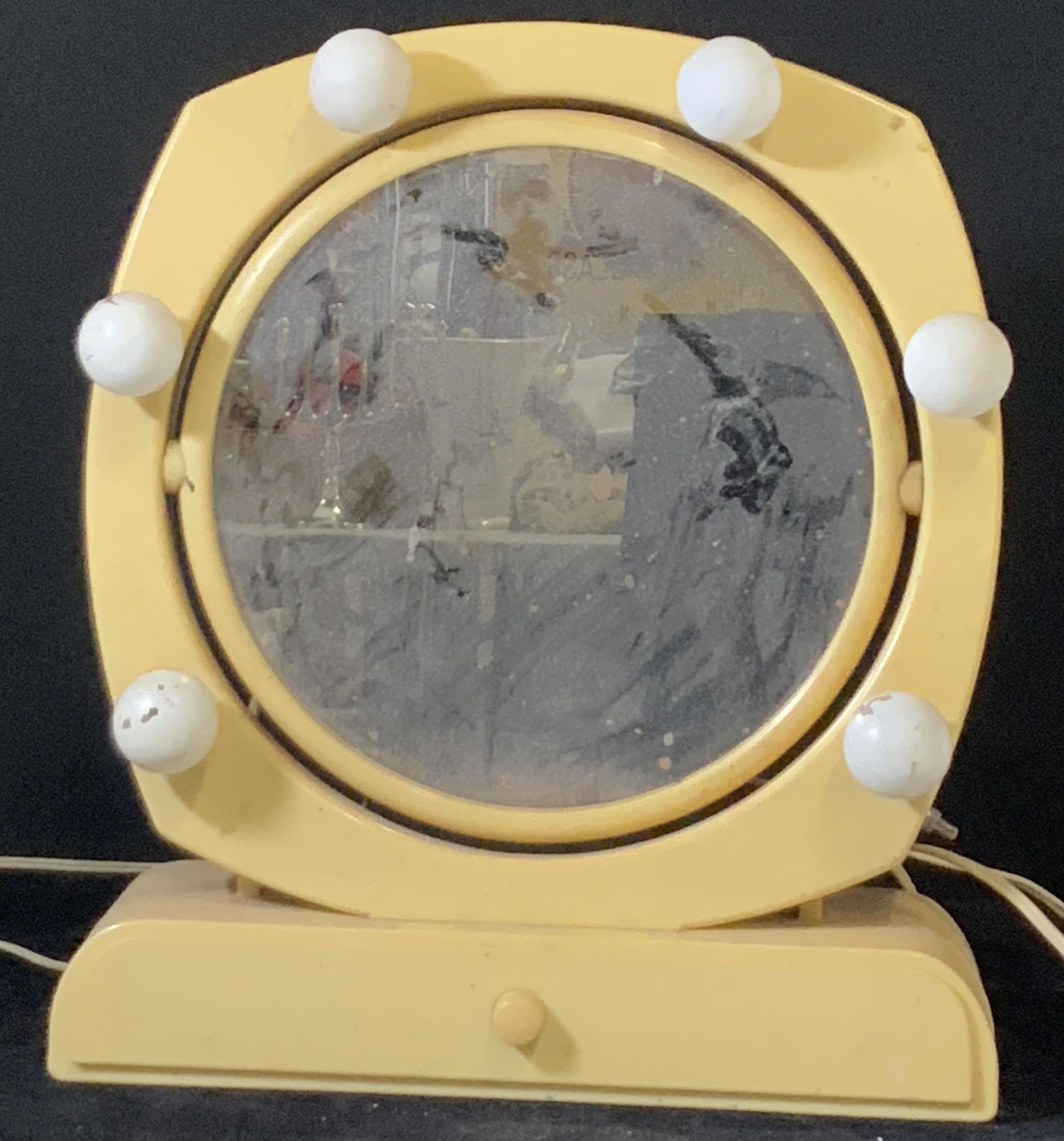 Vintage Lighted Circular Vanity Mirror: Vintage yellow swivel vanity mirror with vanity bulb lights. One draw for storing beauty supplies. Plastic and lightweight. Long cord. Stickers on backside of mirror illegible. Untested. Vintage condi