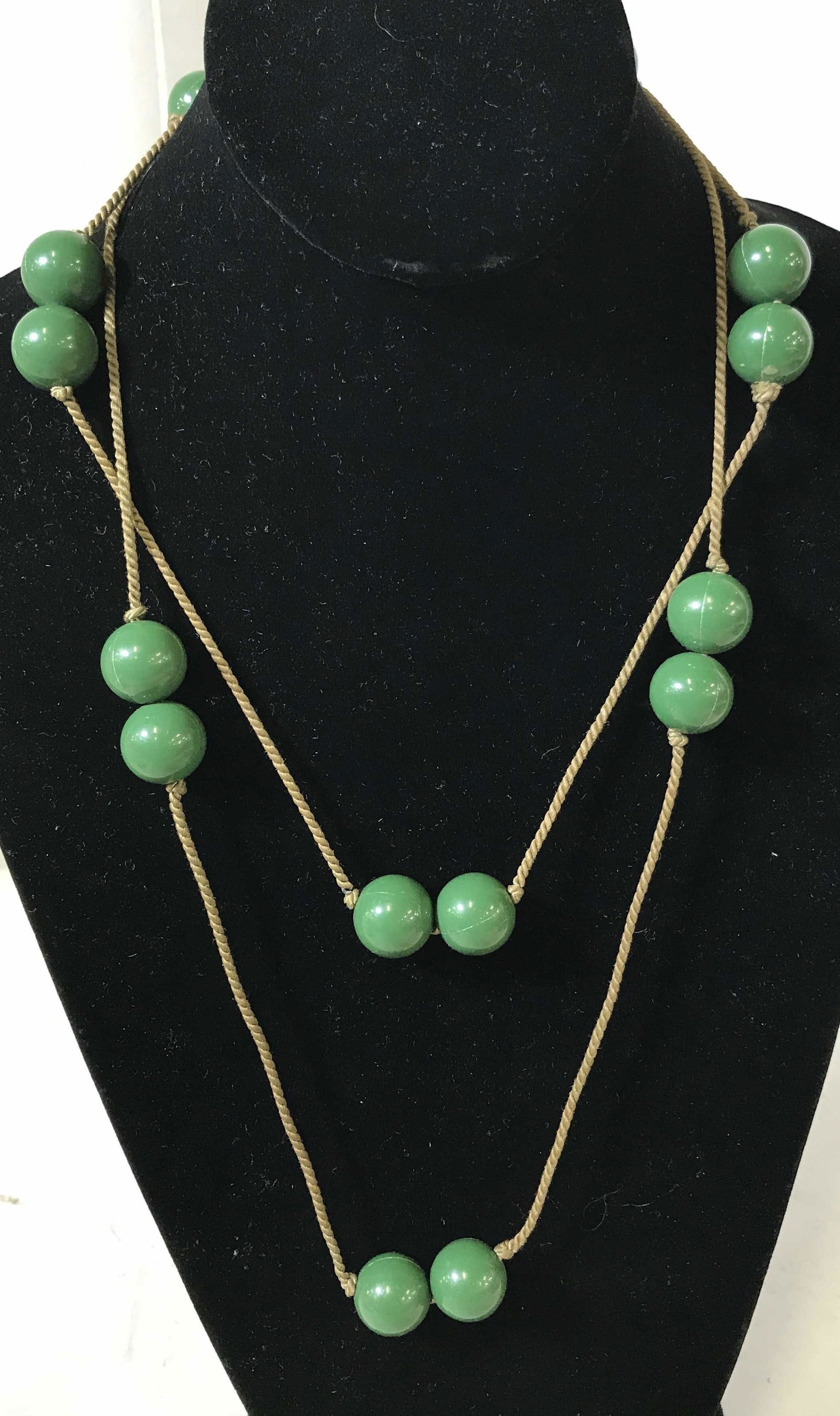 Group Lot 4 Necklaces and Anklet: Group Lot 4 necklaces and Anklet, one double green bead and tan string necklace, one chocker necklace made of brown and white seeds, one necklace made of a copper toned metal chain and yellow beads, o