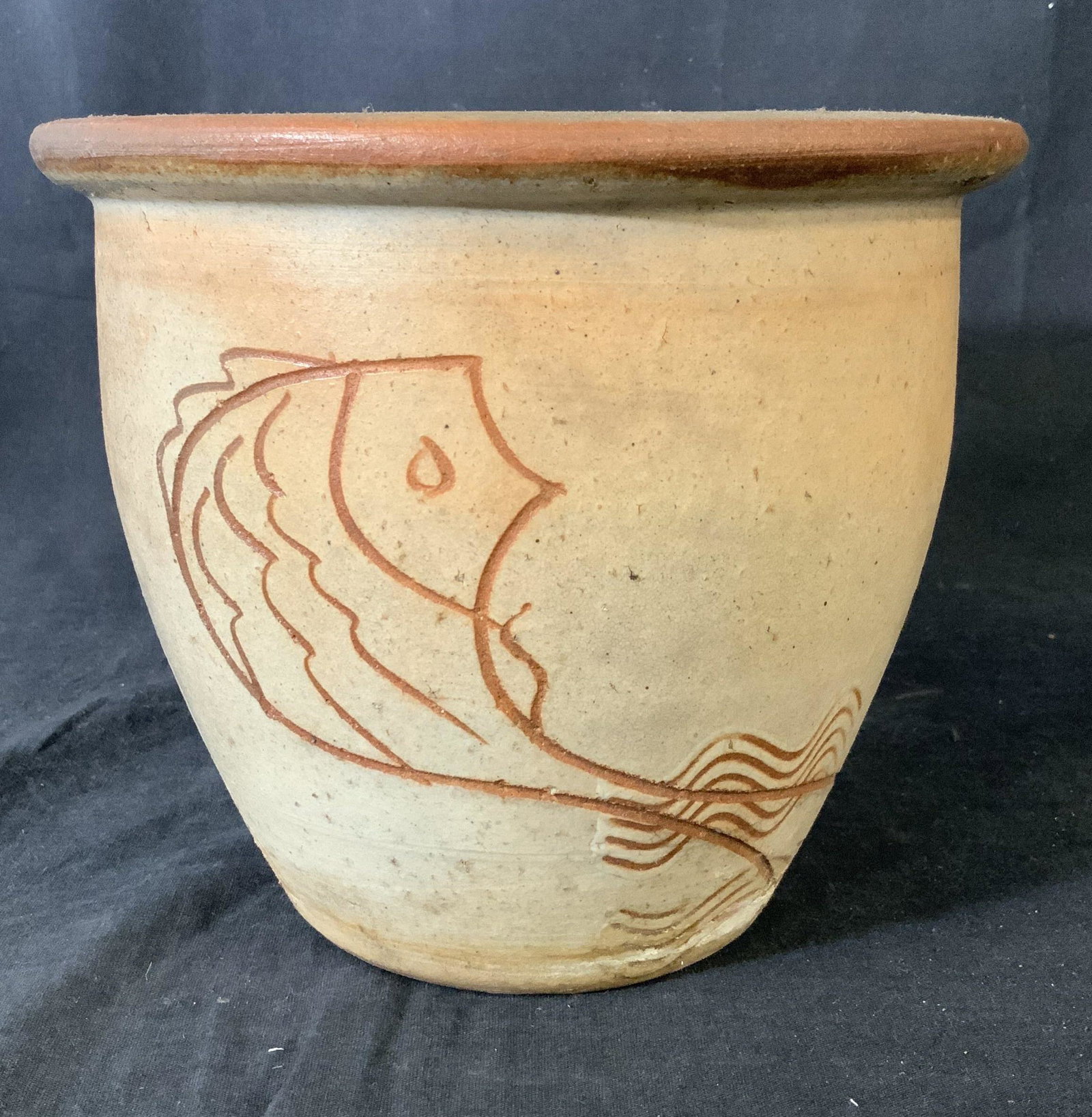 EE Decorative Ceramic Planter: EE Decorative Ceramic Planter, Inscription to rim reads ‘EE’, abstracted fish and wave design, measures 7 1/8 inches tall x 8 1/2 inches in diameter, some wear and discoloration from use but overa