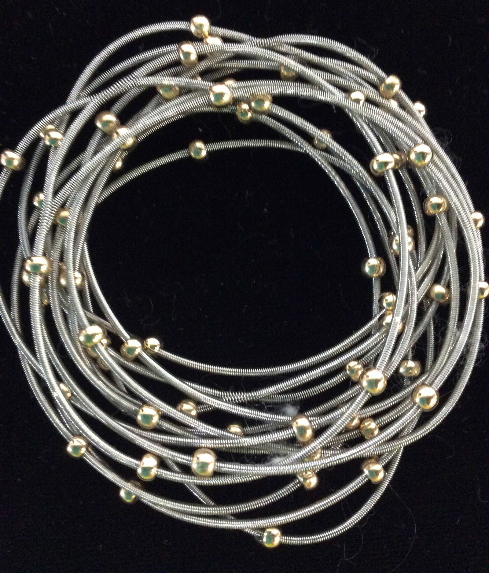 Two Tone Set 13 Spring Bracelets: Contemporary Minimalist Spring Bracelets with gold tone orb beads spaced 1.25 In apart. Not much stretch. App 2.5 in. Bracelets, Two Toned Spring Bracelet Set, Costume Jewelry, Ladies Accessories, Con