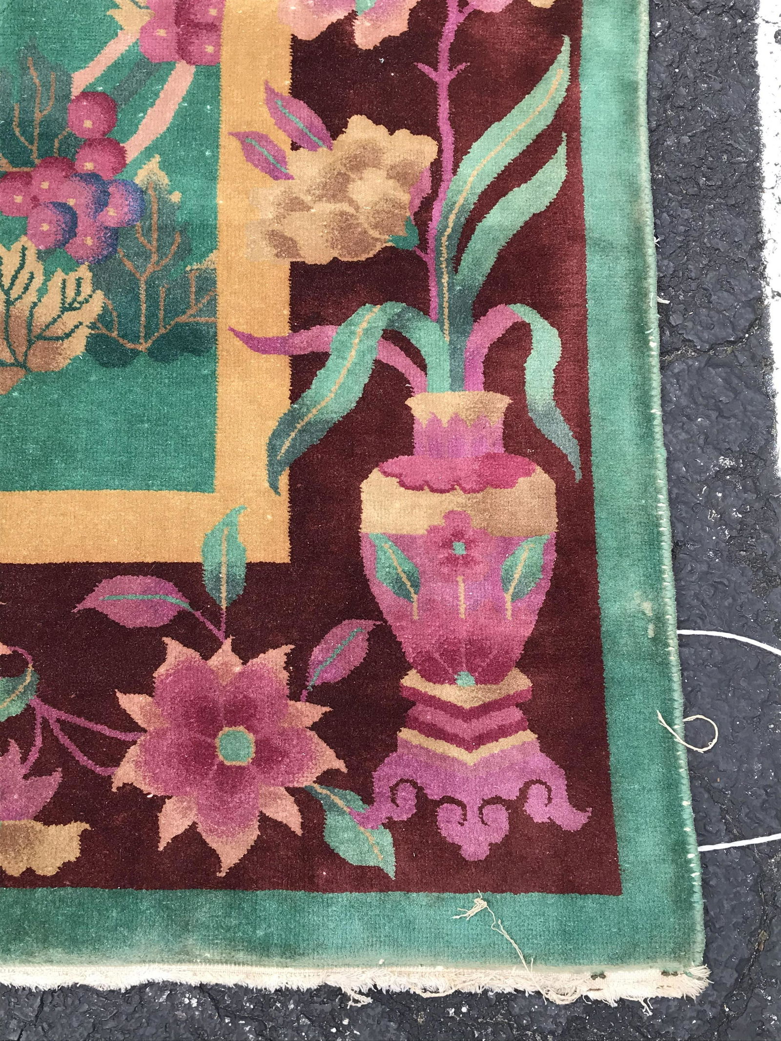 Vintage Chinese Art Deco Wool Pile Rug: Rug is wool pile & handmade. Piece is vintage. Rug contains multi toned floral vine leaf & vase detail. Piece Measures approximately 140 inches long 103 inches wide. Rug, carpet, area rug, wool pile r