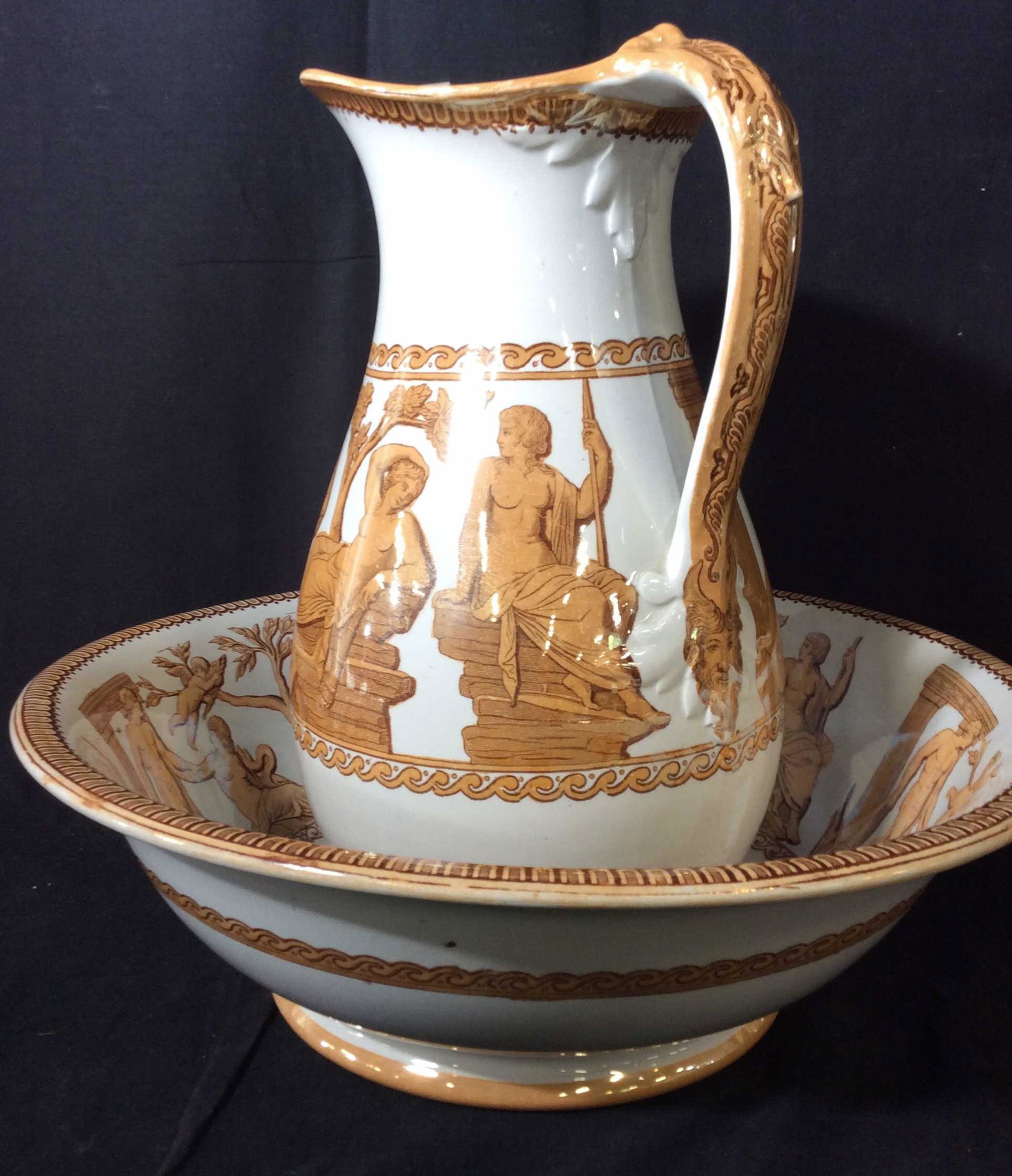 Signed Luster Ironstone Wash Bowl & Pitcher: Antique (possibly) Roman Toga Portland Decor Large Lustre Pitcher Jug. Signed pieces , written by hand reads # 3226 1415, impressed hallmark with ‘P’ ‘71’ Underside Of Bowl. Stamped illegibly.