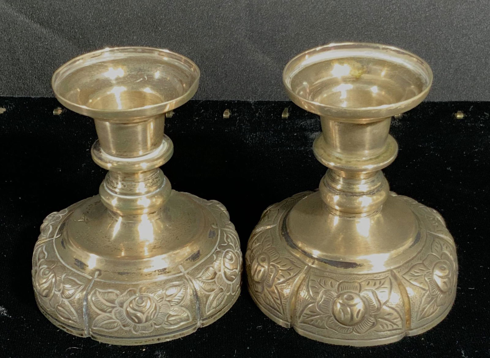 Pair Sterling Silver Repoussé Candle Holders, Mex: Set of 2 vintage, possibly antique, Sterling silver candle holders for tapered candlesticks. Both hallmarked ‘Sterling Made in Mexico’. Art Nouveau Repoussé floral organic base design, short pede