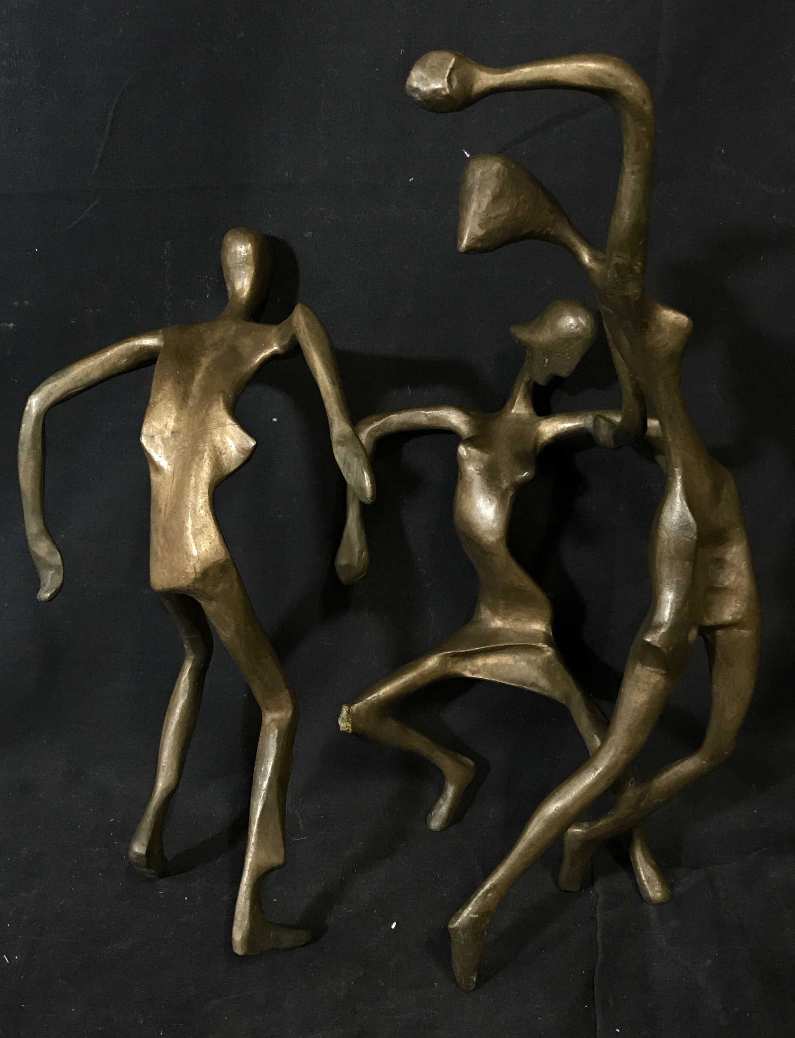Milton Hebald Signed Bronze Sculpture: Milton Hebald Signed bronze Sculpture, signature to back of middle figures leg reads Hebald, subject three abstract thin elongated figures dancing, third figures welding to connect it has broke, third
