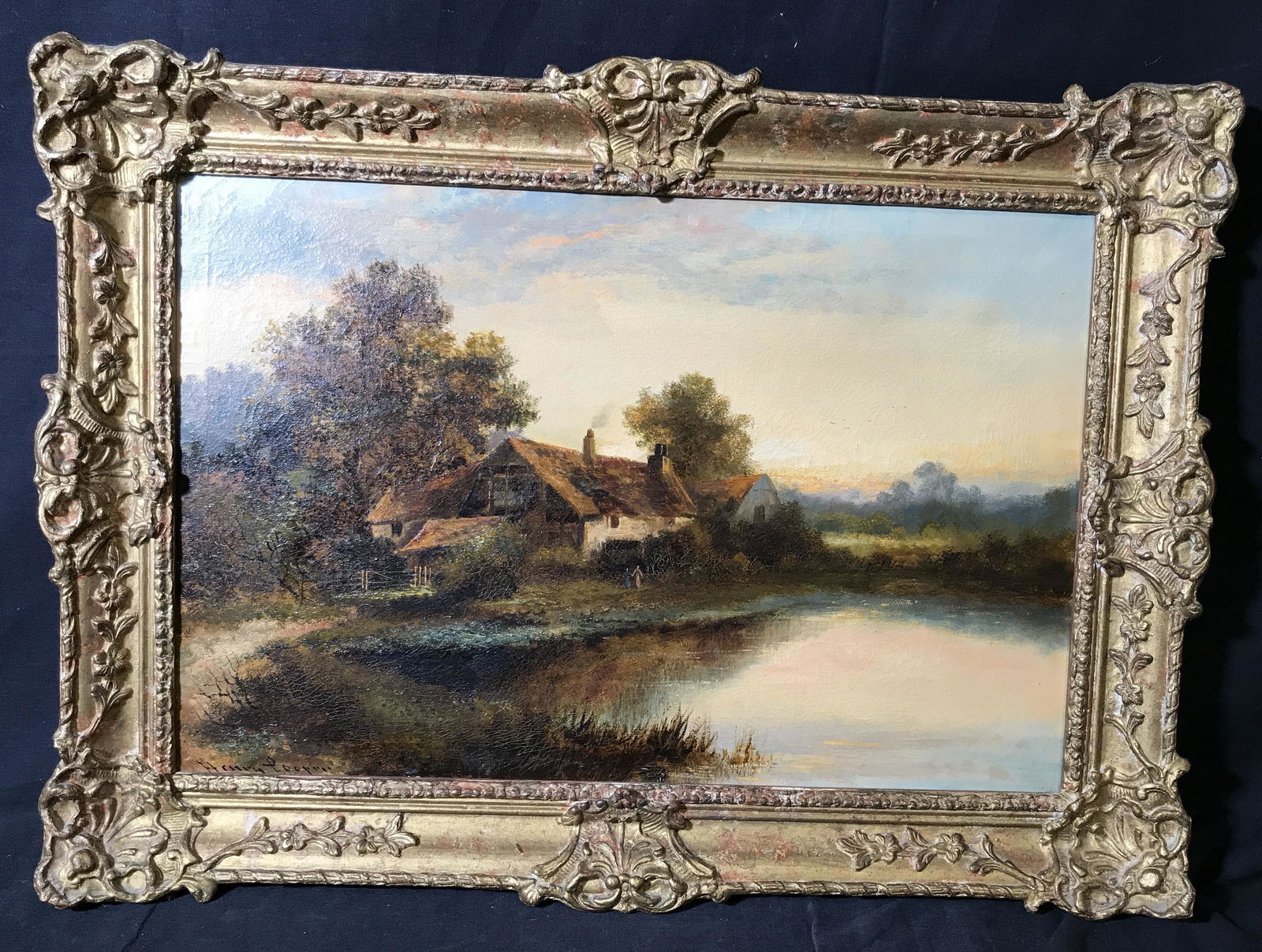 Henry Cooper Signed Oil on Canvas: Henry Cooper Signed Oil on Canvas, signature to the lower left corner reads ‘Henry Cooper’, subject a landscape with a small pond and cottage home, hand carved gilt wood frame, chips to frame, mea