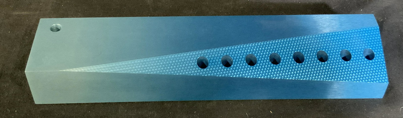 Artist SIgned Modern Art Menorah in Blue: Artist signed on underside, This piece of subtle modern art is a modern menorah with the candle stick holes seated in the front of the item on the corner where there is also a slice out of the block a