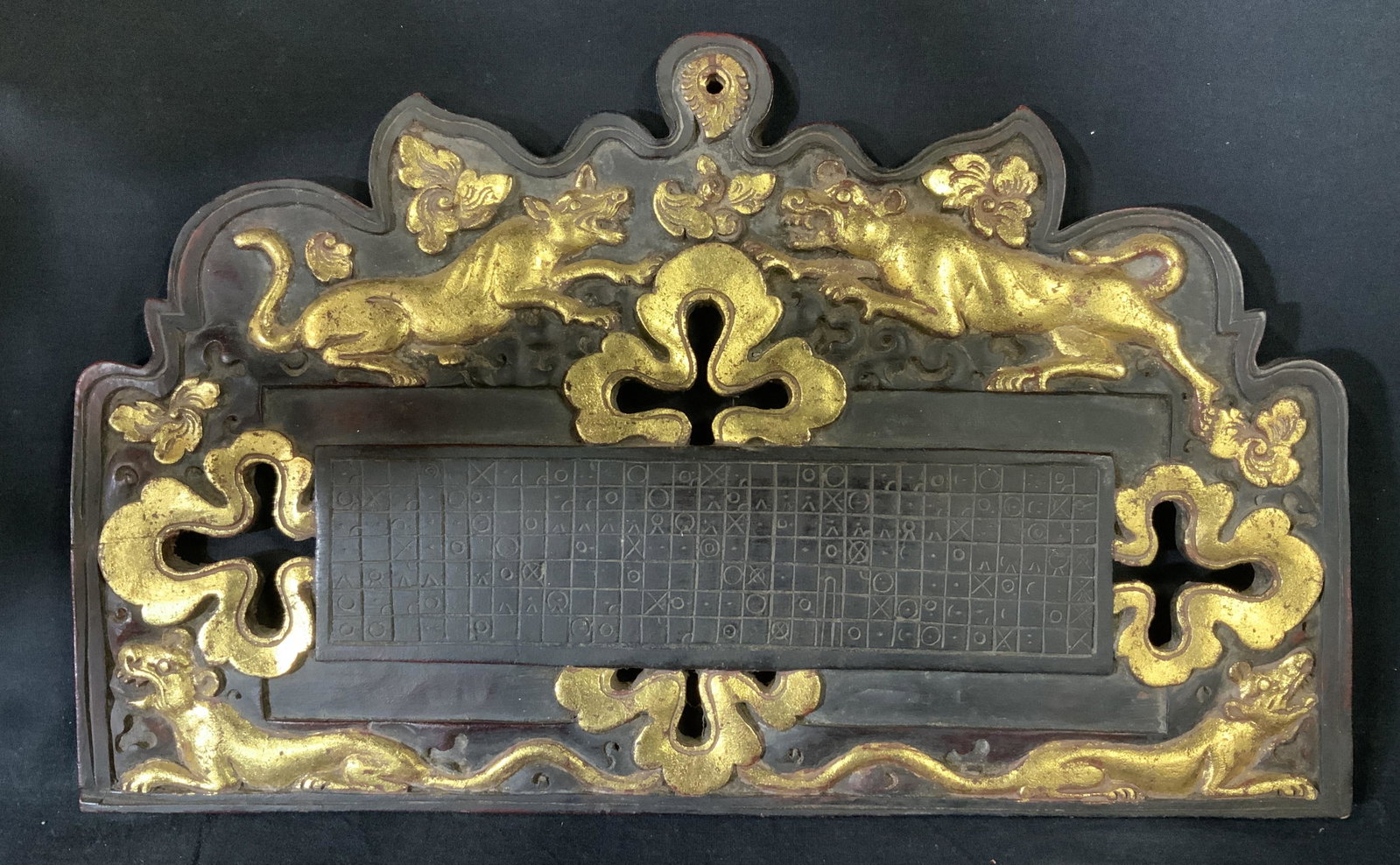 Far East Asian Wooden Calendar Plaque: Far East Asian Wooden Calendar, possibly Indonesian, no apparent inscriptions or stamps, hand carved animals, painted gold, Measures 11 3/4 x 18 7/8 inches, some wear to piece but overall in good cond