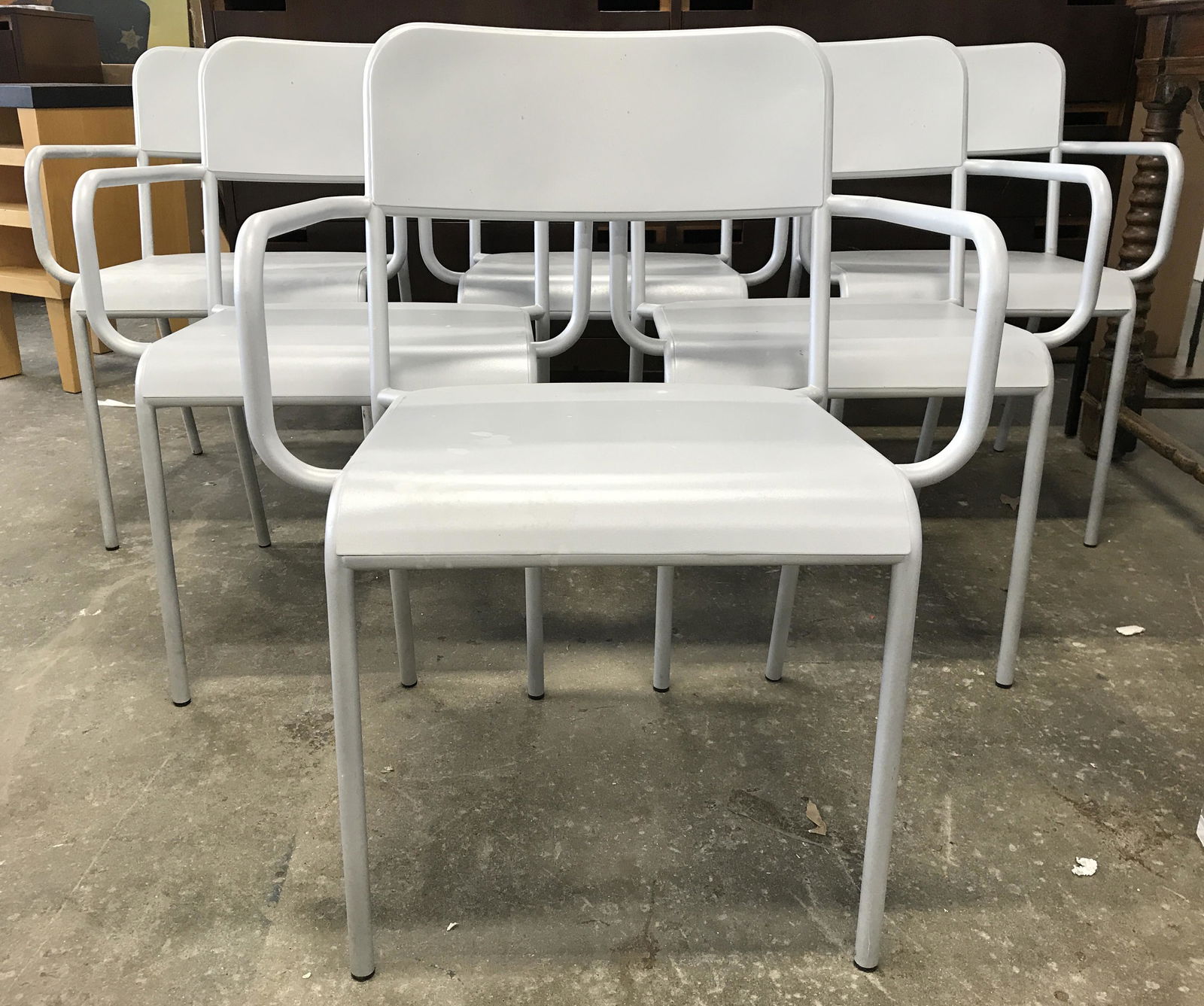 Set 6 MCM Metal Stacking Chair: Lot includes 6 chairs. Each have a light slate tone & are metal. All chairs have armrests. Chairs have mid century modern style. Each measures approximately 30 inches tall 22 inches wide 20 inches dee