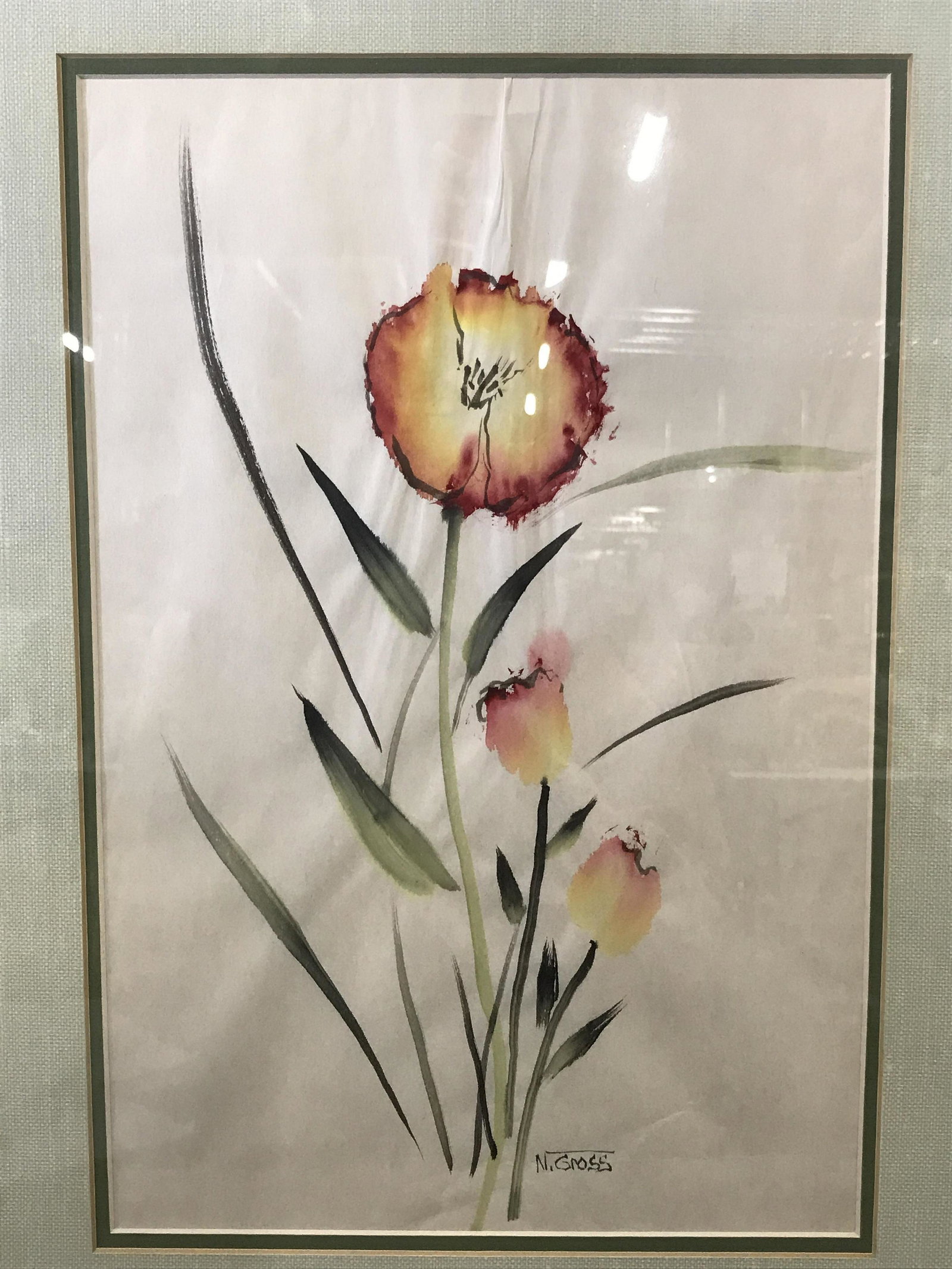 Nancy Gross Signed Watercolor Flowers: Nancy Gross Signed Watercolor flowers on paper, signature to the lower center section, subject red and yellow flowers with long green stems done in a minimalist style, double matted in two different s