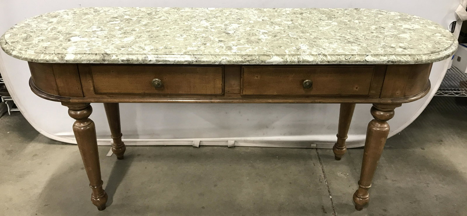 Vintage BLOOMINGDALES Marble Topped Console Table: Vintage console table, marble top is removable. Legs are turned, drawer pulls are brass, drawer joints are dovetailed. Measures approx 30 inches H, 66 inches W, and 22.5 inches deep. Label on undersid