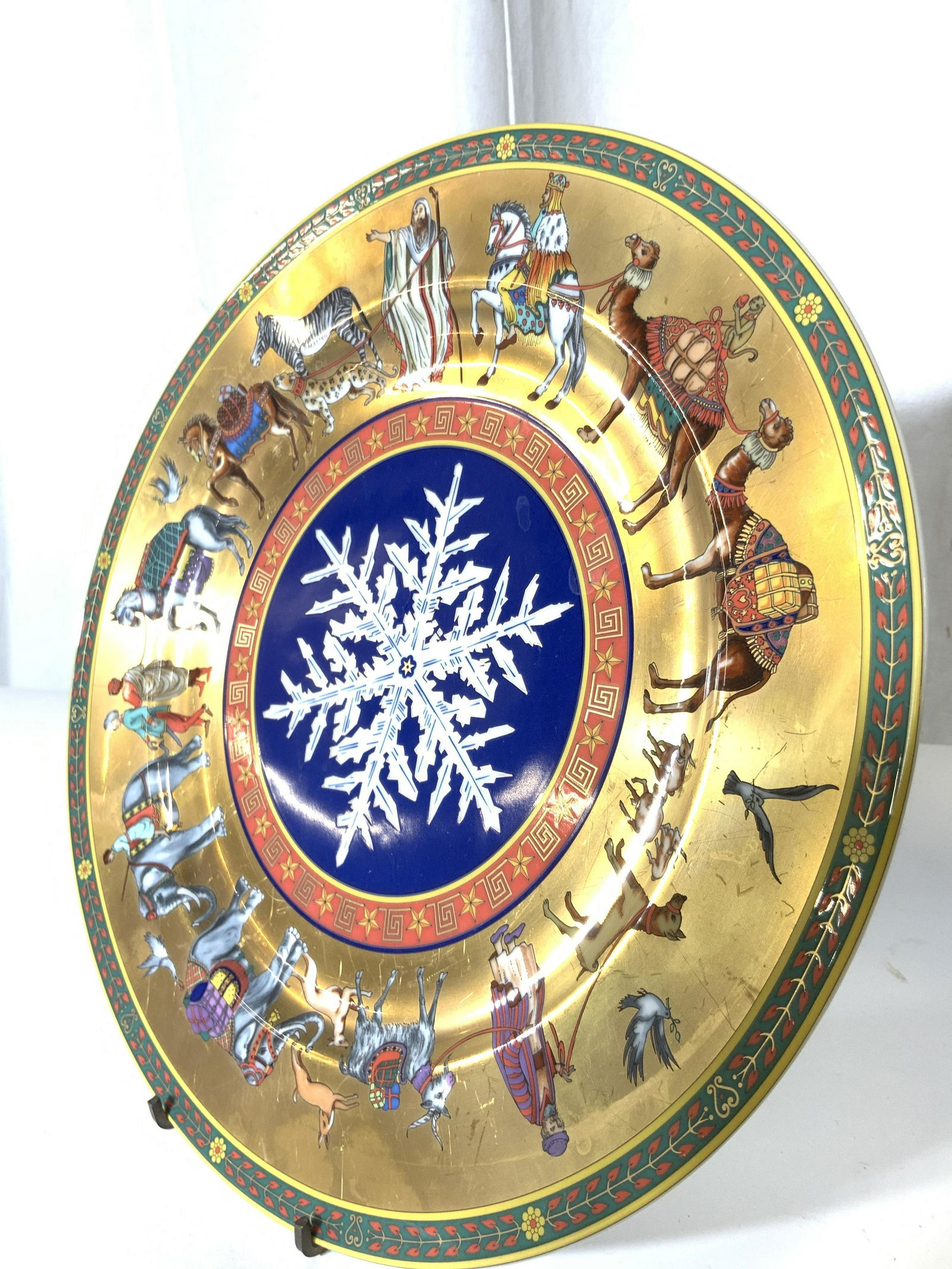 Rosenthal Studio Line Versace Gilt Ltd Ed. Plate: A vintage art and design connoisseur collectible, wall plate c. 1998 titled CORTÈGE DE NOEL, CHRISTMAS WITH VERSACE. Plate number 6488/15,000. Heavily gilt 22k porcelain hand painted depicting desert