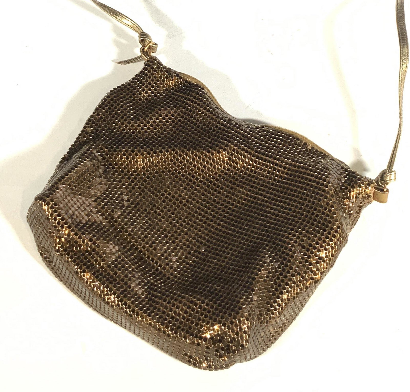 Vintage Whiting And Davis Vintage Cross Body Purse: Gold tone shimmering sequin shoulder / crossbody bag. Zipper closure. Interior fully lined with brown textile patterned with ‘ Whiting and David ‘. One interior pocket holding a small slip of pape