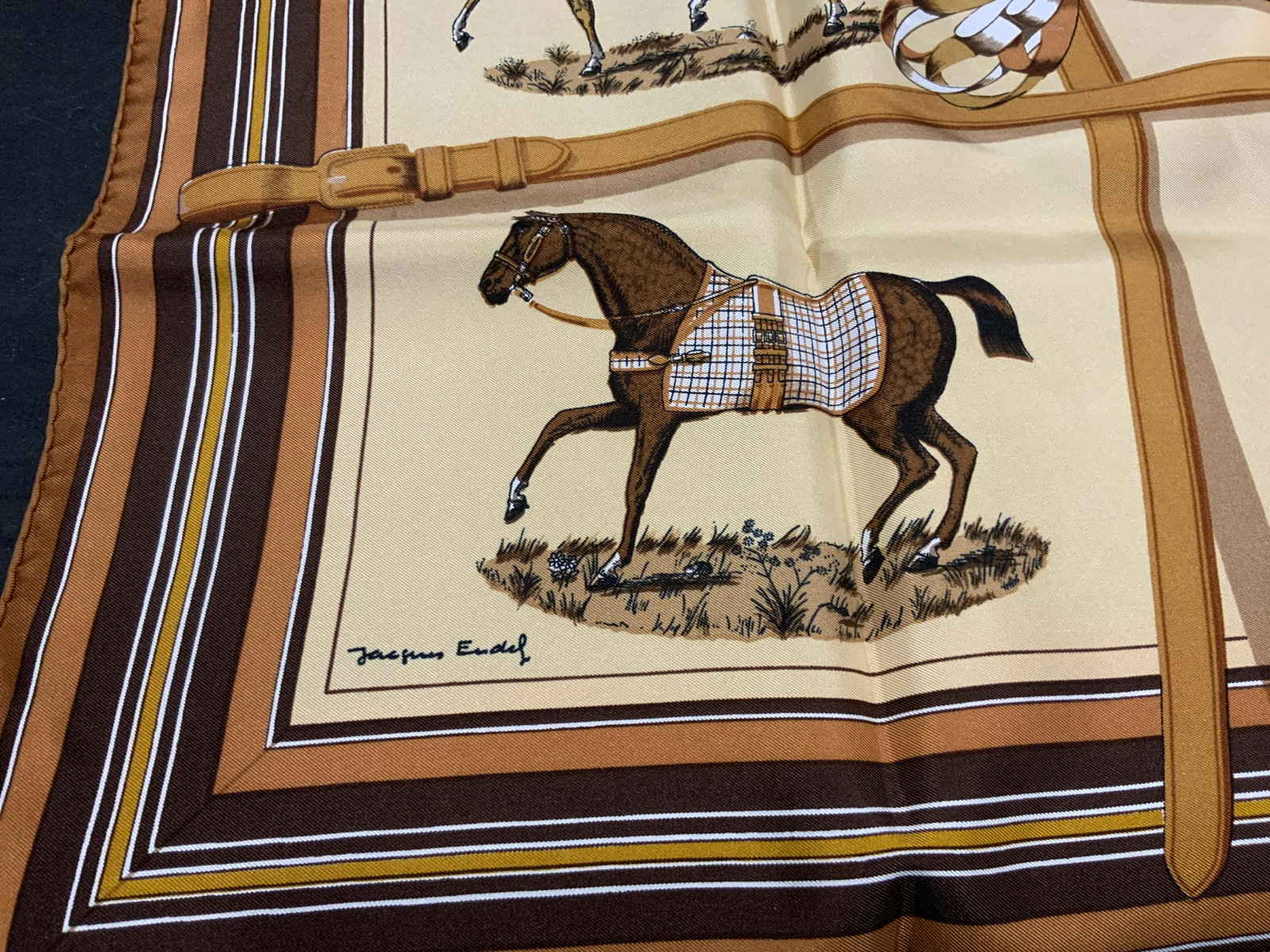 Signed Hermès Paris Jacques Eudy Horse Scarf,Boxed: In original Hermès Paris Orange Gift Box ( box good condition), a signed Silk Hermès Paris ‘ COUVERTURES ET TENUES DE TOUR PIUR L’ ÉCURIE, L’ ATTENDTE ET LA PRÉSENTATION EDITÉES PAR HERMÈS