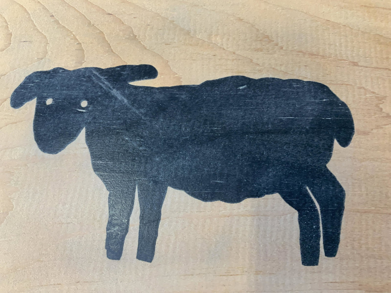 Handmade Shaker Wood Box, Sheep Decor: This round box is handmade with copper rivets, possibly birch wood or shaved pine. 11.25 in diameter. 4.5 in ht. Filled with packaging grass Illustration of Black sheep on lid. Handmade Wood Box, Shak
