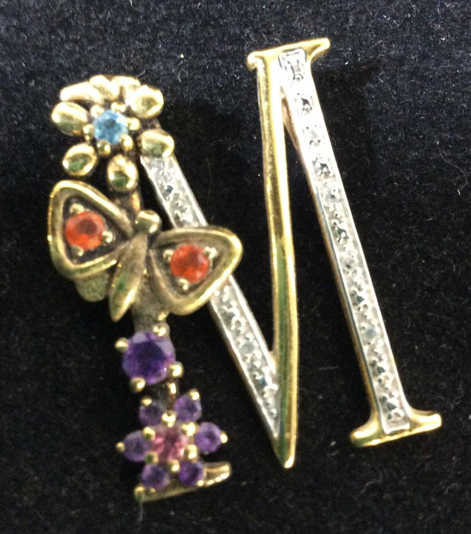 M Vermeil Sterling Silver & Rhinestone Pendant: Butterfly and flower embossed accents. Capital Letter M charm, Reads 925. multi colored Semi Precious stones. Ameritrust and blue topaz. Tests + on gem tester. Orange stone possibly Spessartite ( oran
