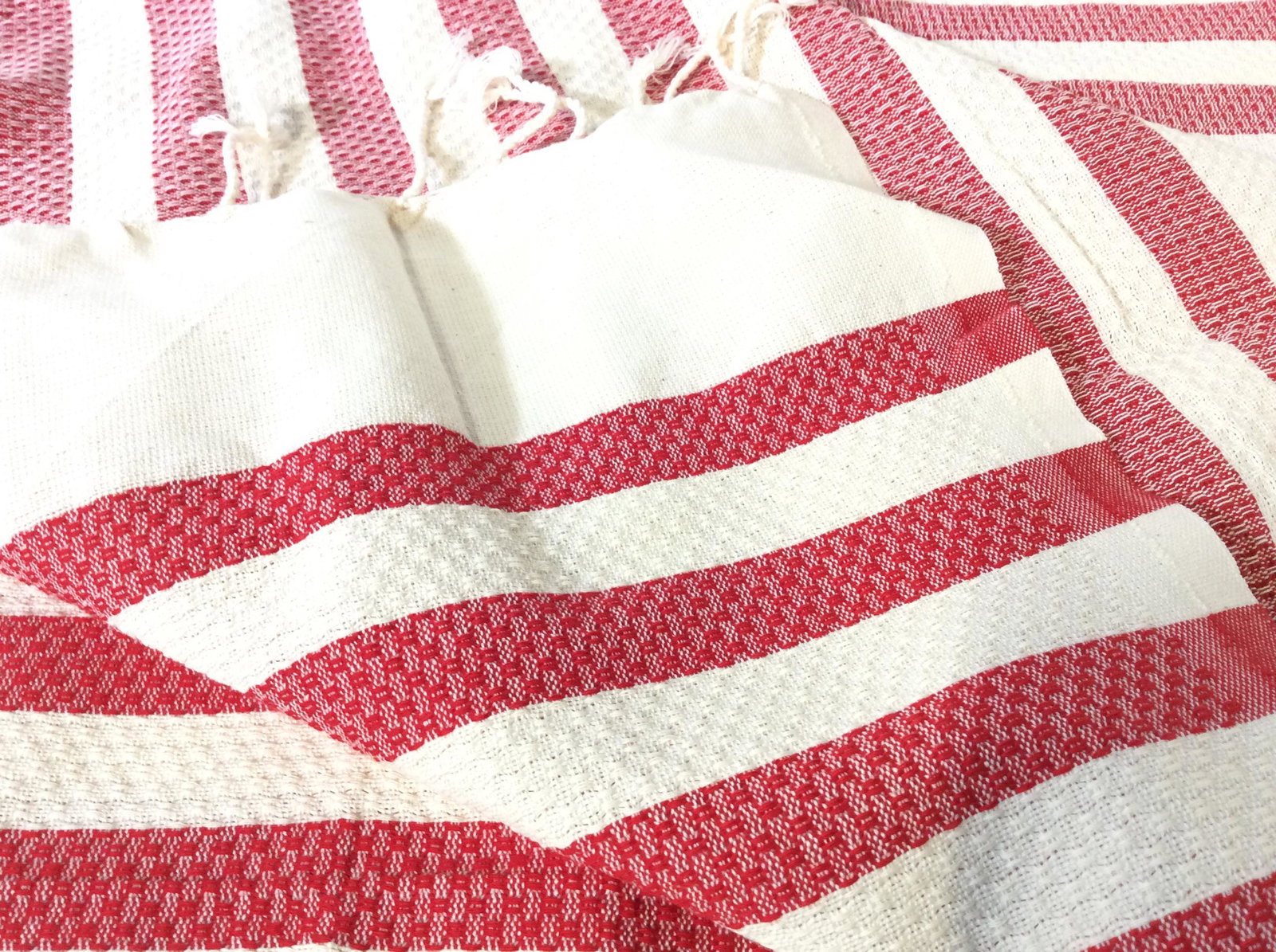Pair Woven Red & Cream Striped Textiles, Tunisia: Textured textiles, use as tablecloths, beach or lawn covers, upcycle. End Tassels, thick woven cotton, app 38.5 x 70 in. Like new. Woven textured cotton textiles, cream & Red, Sandy Beach Cover, Made 