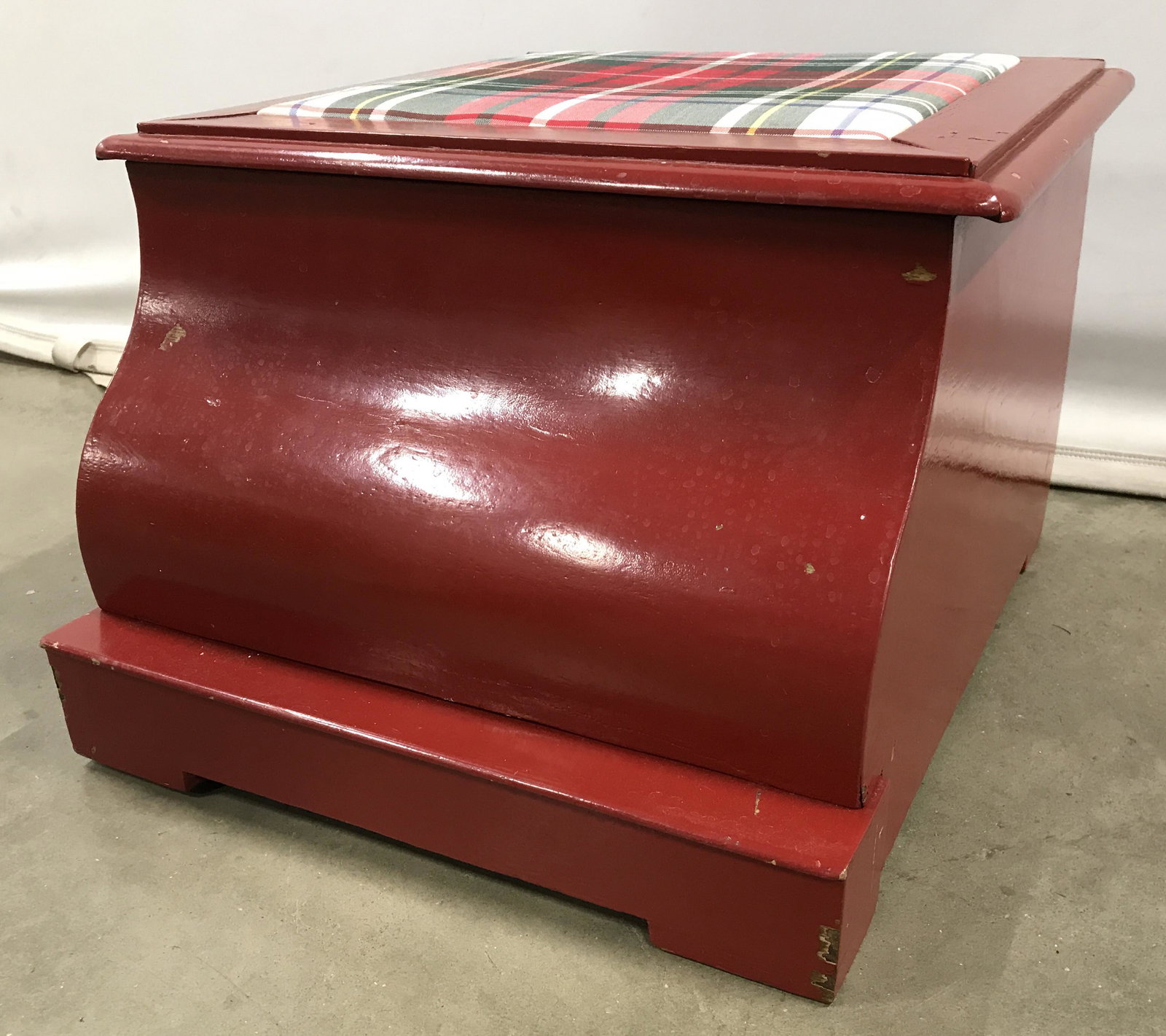 Antique Red Toned Lidded Step Stool: Step stool is red toned and wooden. Piece appears to be antique . Piece has upholstered area on top of lid. Piece measures approximately 18 inches Long 16 inches wide 10 inches tall. Footstool, antiqu