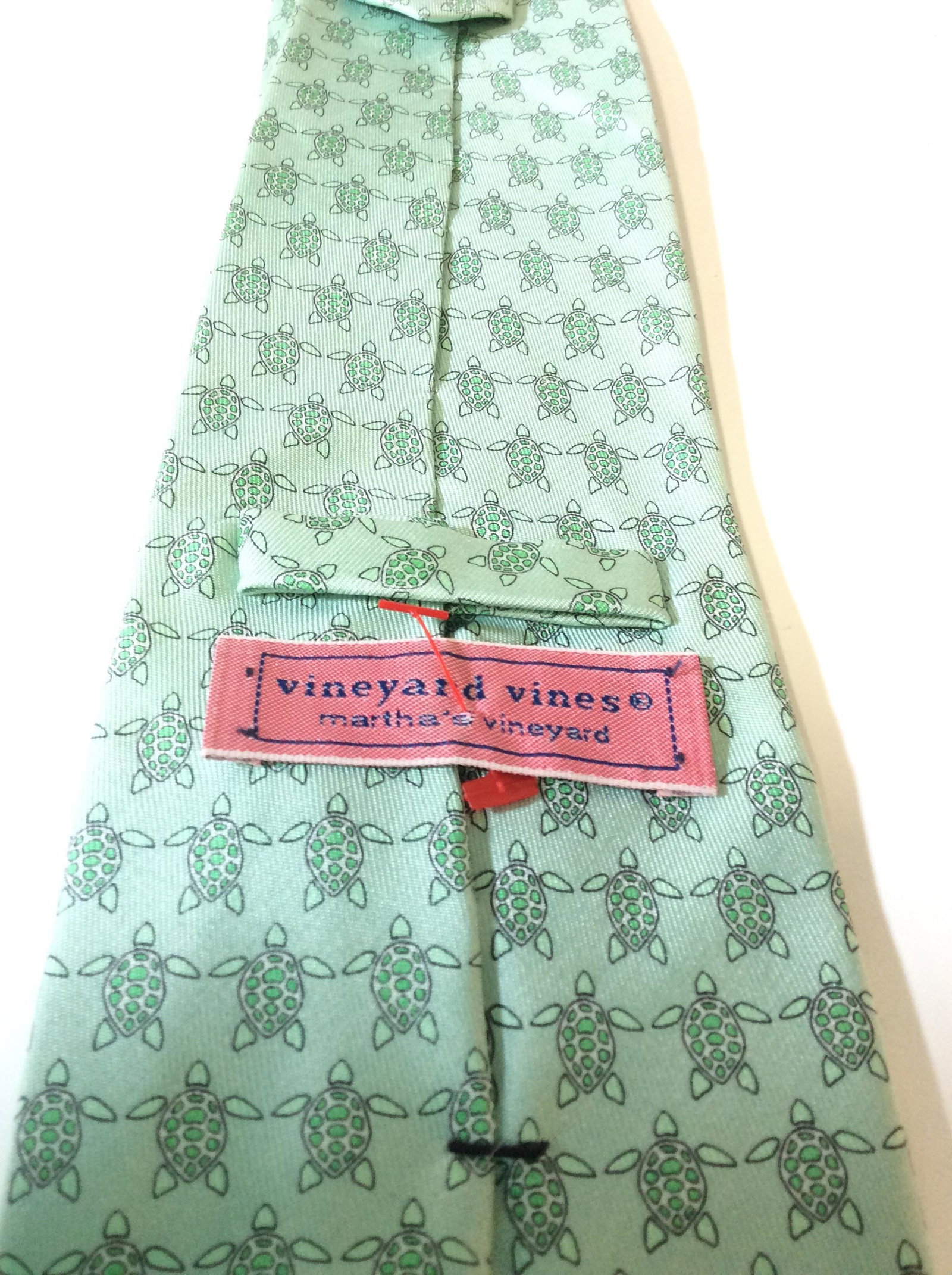 Designer VINEYARD VINES Silk Turtle Neckwear: Signed Luxury Designer Tie, Seafoam green with Reticulated Turtle pattern outlined in thin black print. 100% silk. New. Not worn. Also reads ‘Hand picked by Shep & Ian’ handmade in USA Collectible