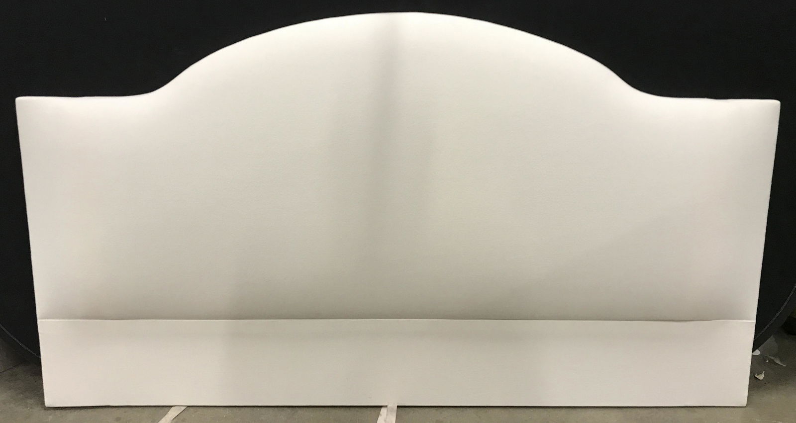 White Toned Upholstered Headboard: Upholstered Headboard, White toned. Measures approx 39.5 inches H, 72.75 inches W. Wear is consistent with age and use. Headboard, bed frame, bedroom accessory, upholstered furniture, bedroom furnitur