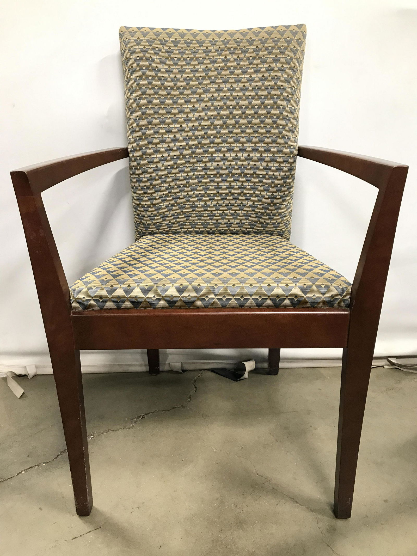 Set 4 Upholstered Wooden Side Chairs: End chairs are wooden. Each have slate teal & gold toned upholstery with triangle shape pattern detail. Each chair measures approximately 38 inches tall 23 inches wide 24 inches deep. End chairs, set