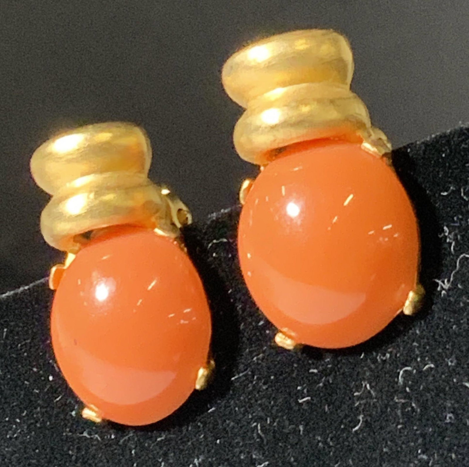 Vintage Coral Style Clip On Earrings: Coral colored stone style earring with gold toned accents and backings. Set with 4 prongs. Clip on style. Approx. 1 x 1 in. Costume Earrings, vintage jewelry, Clip On Earrings, Statement Earrings, Lad