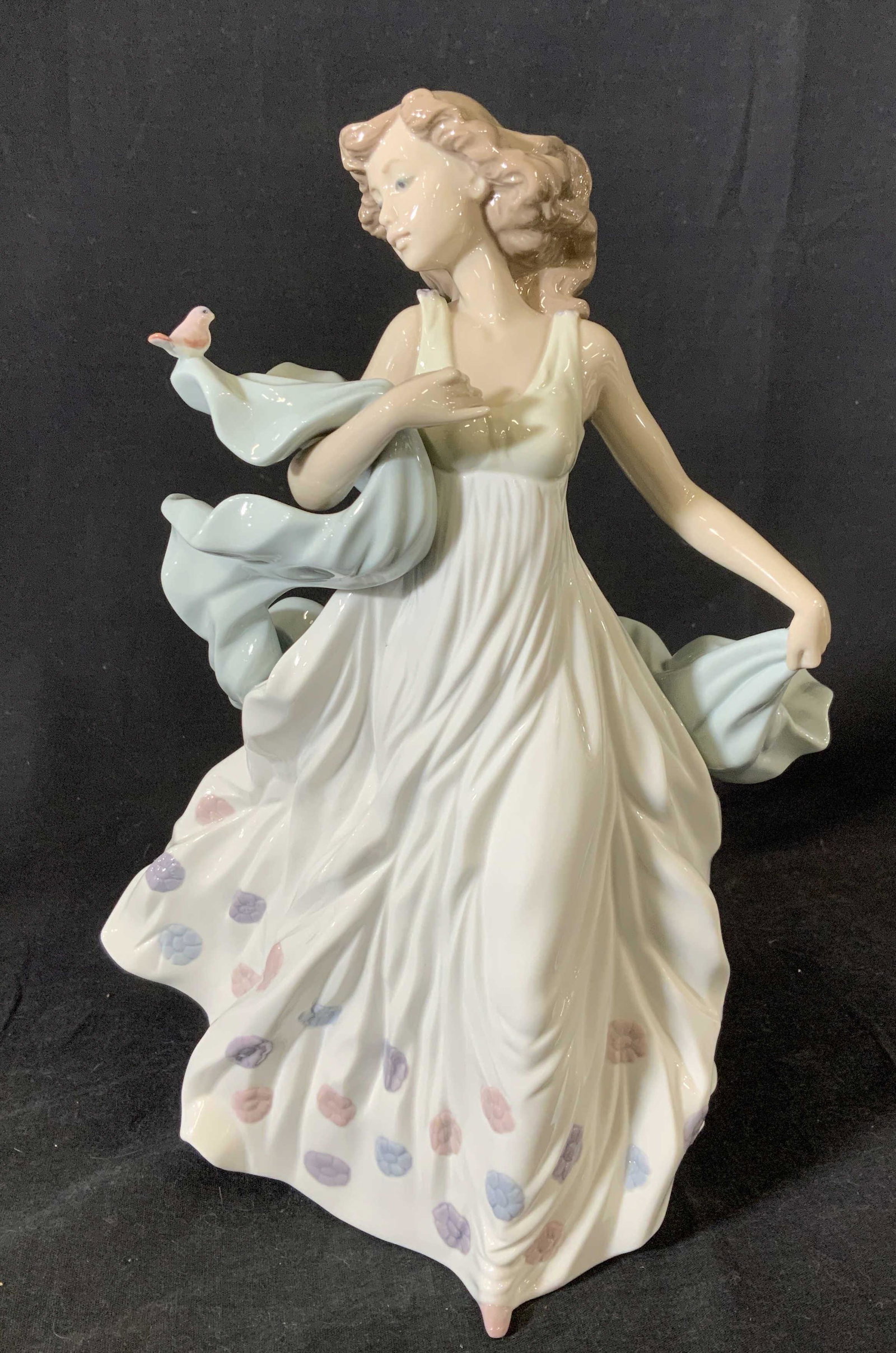 Vintage Lladro Summer Serenade Porcelain Figurine: Vintage Lladro Summer Serenade Porcelain Figurine, inscription to base reads ‘lladro hand made in Spain Daisy 1994’, H-12 F 235’, a woman in a shawl and dress with bird, measures 12 3/8 inches t