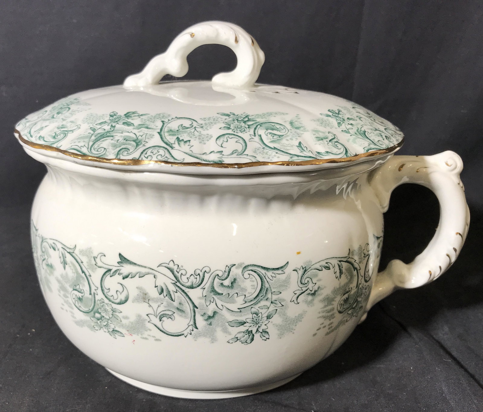 John Maddock & Sons English Porcelain Chamber Pot: John Maddock & Sons English Porcelain Lidded pot, underside of pot reads ‘John Maddock & Sons Royal Vitreous England Rococo’, both pot and lid have a green vegetal design to the surface as well as
