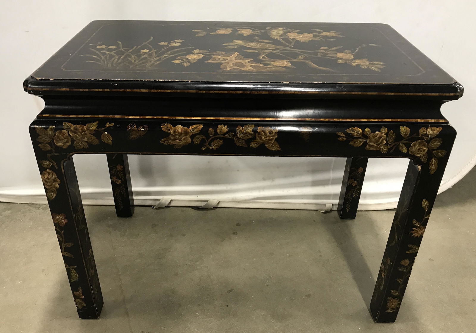Vintage Hand Painted Side Table: Antique Vintage, possibly antique, side table. Lacquered finish, hand painted floral detail. Tabletop is painted to depicts birds on branches, tabletop border depicts various insects. Measures approx