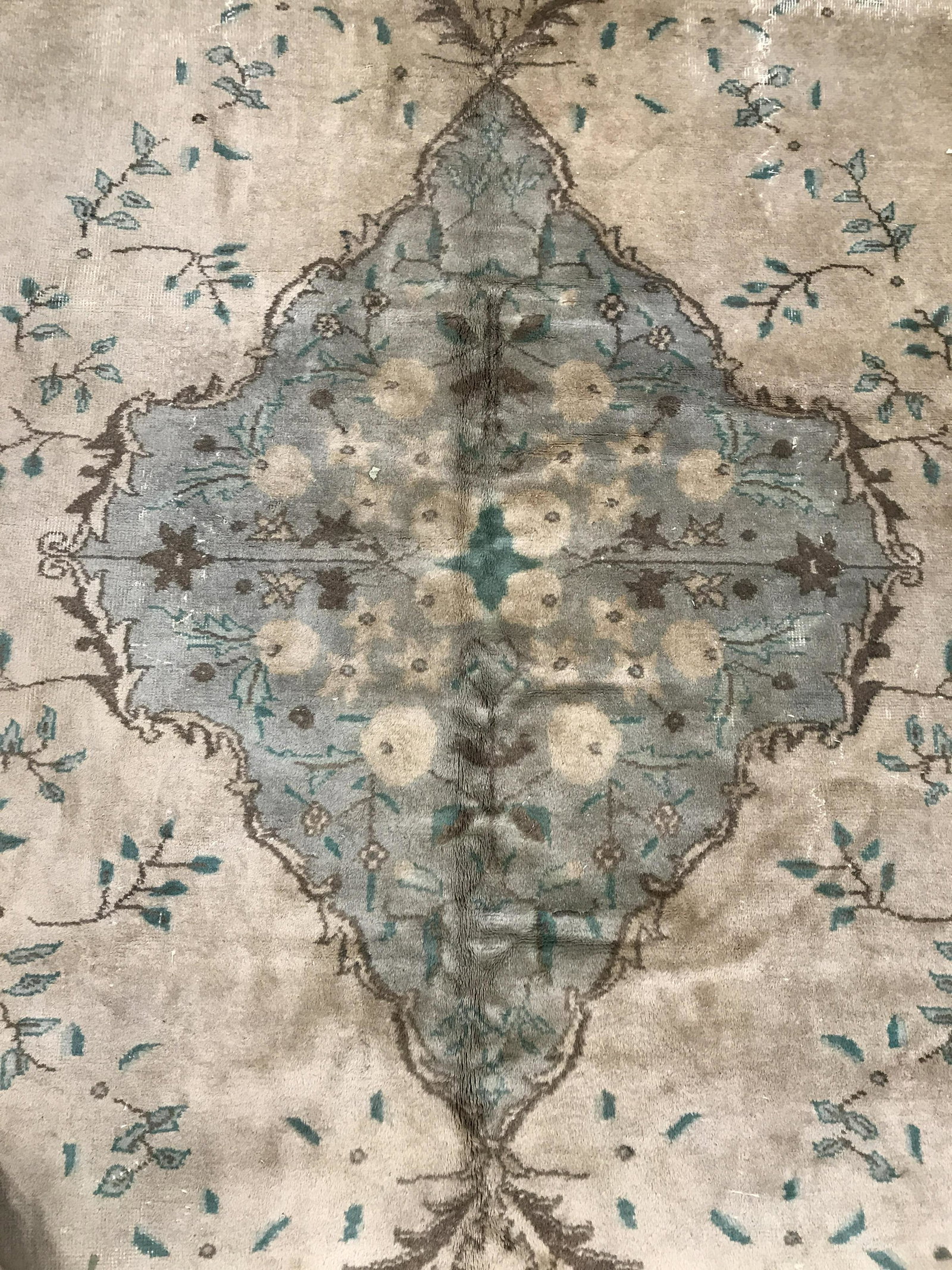 Vintage Floral Detailed Handmade Wool Rug: Rug is wool and handmade. Piece is vintage possibly antique. Rug contains floral, vine and leaf detail. Piece measures approximately 120 inches long 80 inches wide. Rug, carpet, area rug, wool rug, ha