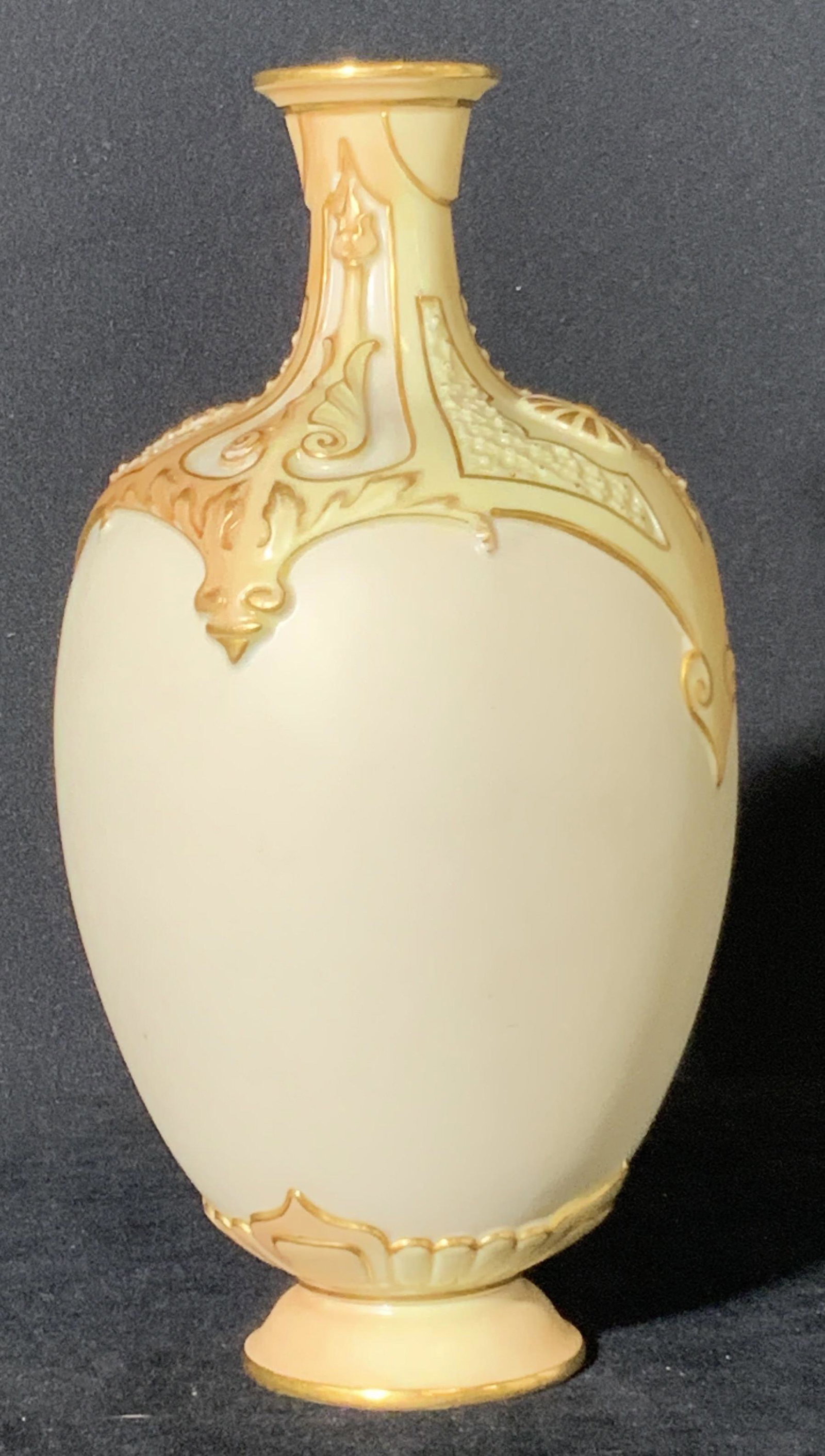 Signed Porcelain ROYAL WORCESTER Vase: White porcelain w/ decorative embossed porcelain designs. Gilt line work & yellow and orange hues. Underside stamp: Royal Worcester, England, RDNO203560, 1625, ‘W’. Approx. 8 in. height. Approx. 4