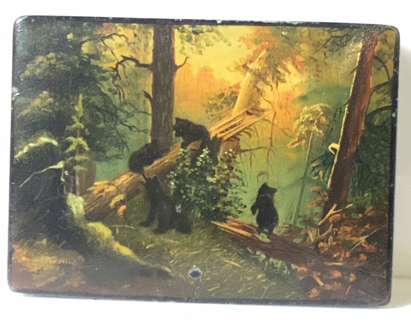 Wooden Lacquered Trinket Box: Trinket box w/ nature scene featuring bear cubs. Black lacquered exterior, interior red. Interior has mild chips. Approx. 4.5 in. width. Approx. 1 in. height. Collectible, decorative accessory, bears,