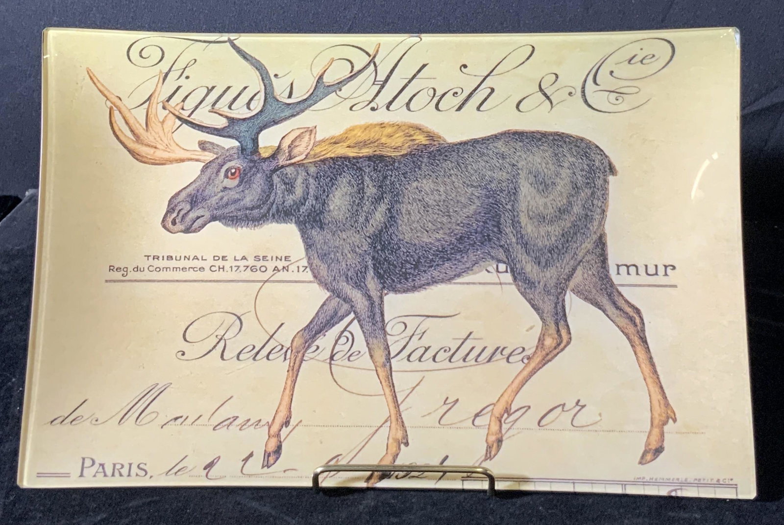 Signed Carol Kaas Handmade Glassworks Tray: Hand made glass tray depicting a moose. Decorative writing adorns the background. Underside signed in gold toned paint / marker reads: Carol Kaas. Underside reads: KAAS Glassworks, Handmade Decoupage,