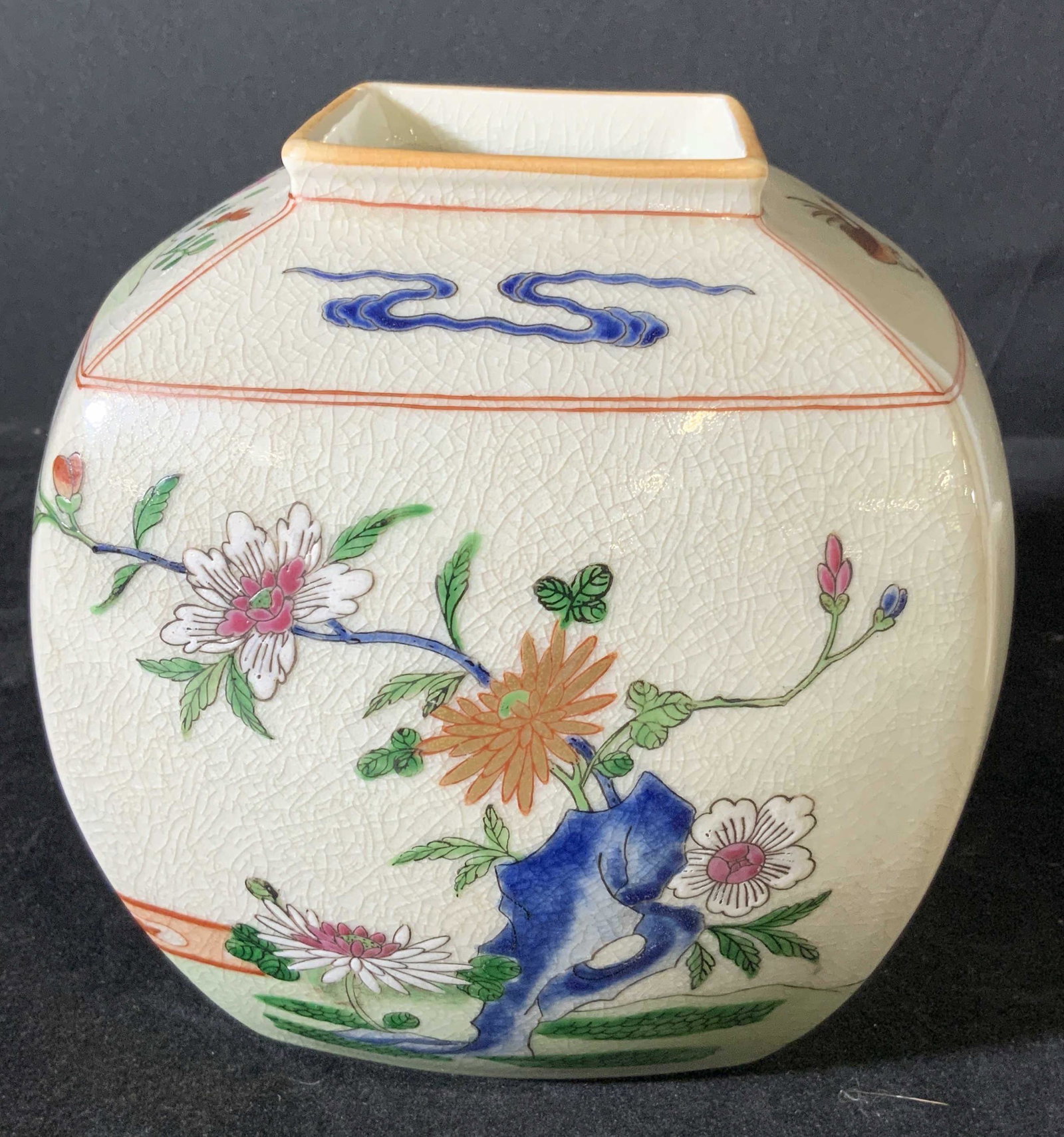 Hong Horizons Hand Painted Asian Porcelain Vase: Hand painted porcelain vase featuring various water fowls, ( cranes / cormorant ) & lotuses. Embossed petals and feathers. Piece has square mouth. Crazing throughout. Underside stamped: Hong Horizons,