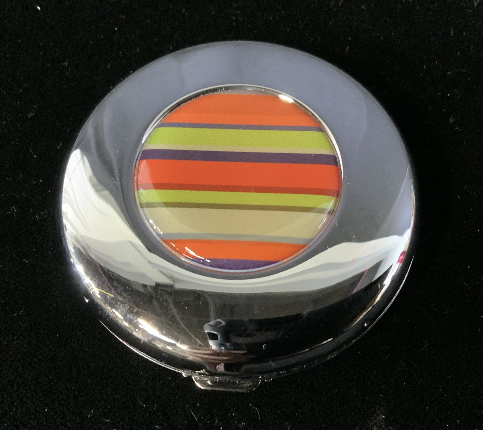 Troika Mirrored Compact: Troika Mirrored Compact, inscription to compact reads ‘Troika’, silver toned metal with striped design, measures 2 1/2 inches in diameter, comes in original packaging in good condition, Troika, mi