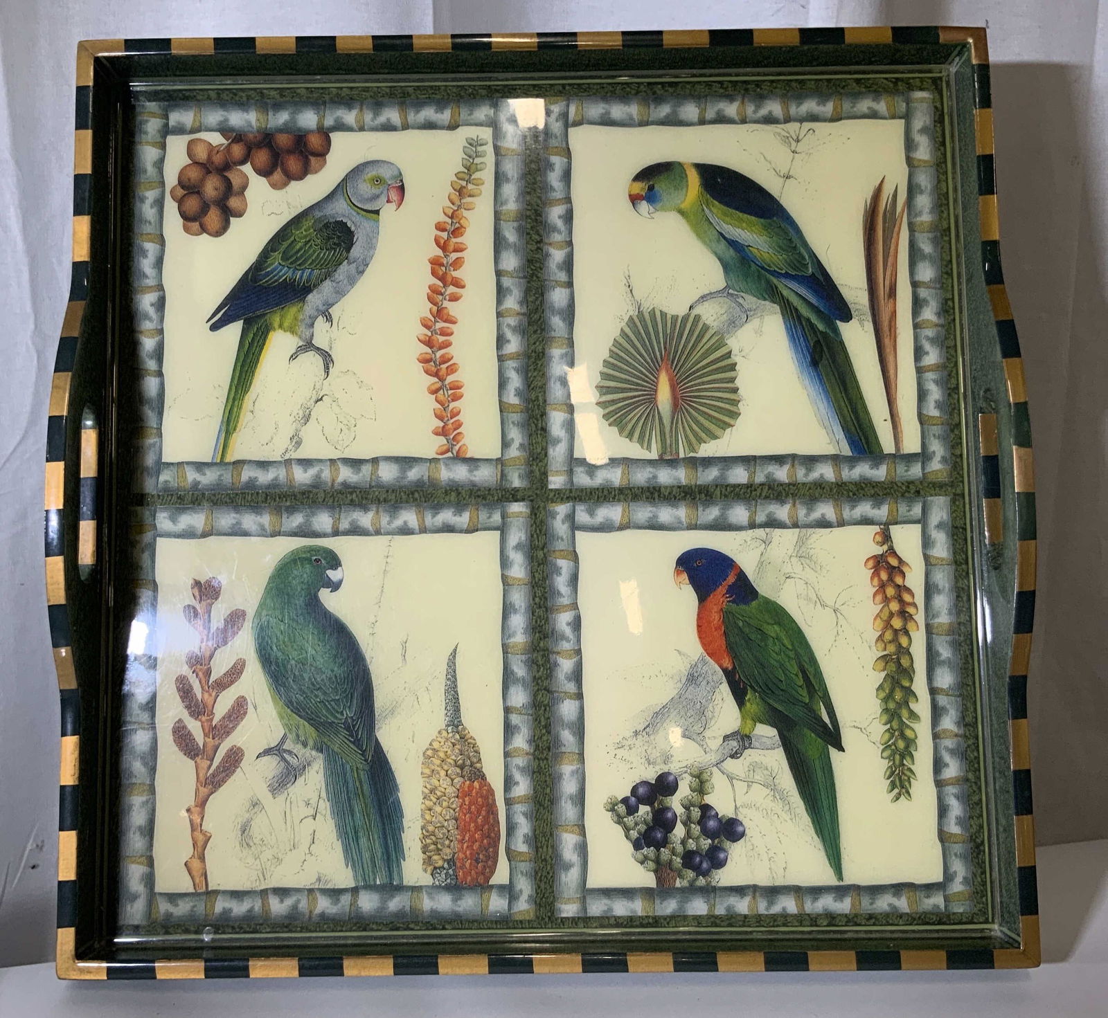 Signed Designer ‘Les Perroquetes’ Serving Tray: Oversized laminate wood serving tray with print design of 4 parrots. Carry handles. Backside hand signed by artist , reads ‘Les Perroquetes’ ‘Annie Modica’. 20.25 in. Ht 3 in. Serving tray, Br