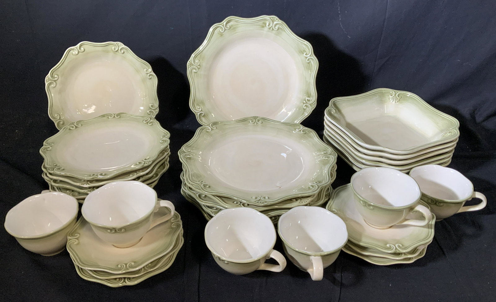 Set 30 COLORÉ by Lenox Embossed Ceramic Dinnerware: A ceramic set that sets you back to Provence France. Light green fade to cream coloring ceramic plate set, embossed scrolls and fans resembling a fleur de lis. 6 dinner plates, 6 luncheon plates ( cou