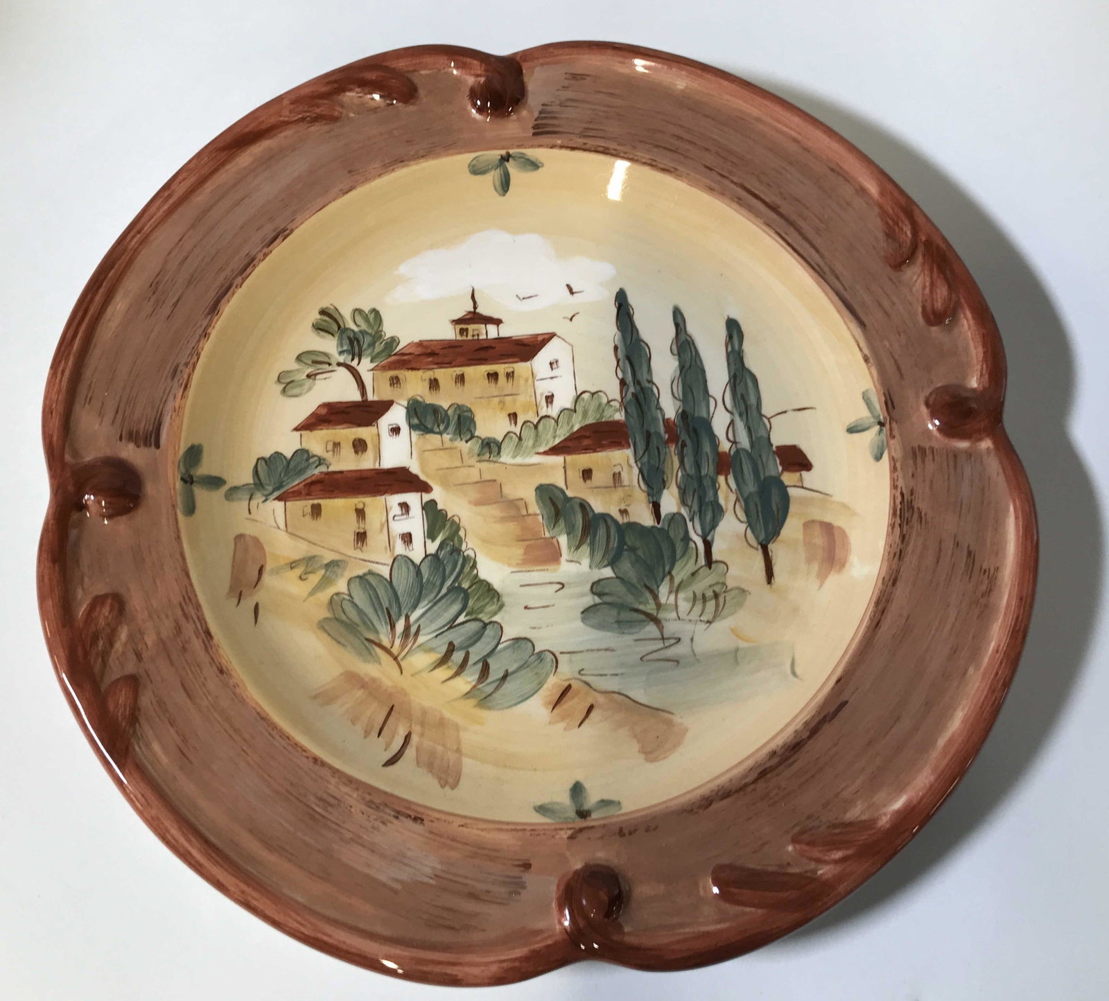 Set 4 Signed Tuscan Landscape Ceramic Plates: These Luncheon plates correspond to a platter also up for auction. They are microwave and dishwasher safe. A bit weighted but truly transport you. Illustration by signed artist Pamala Gladding ( verso