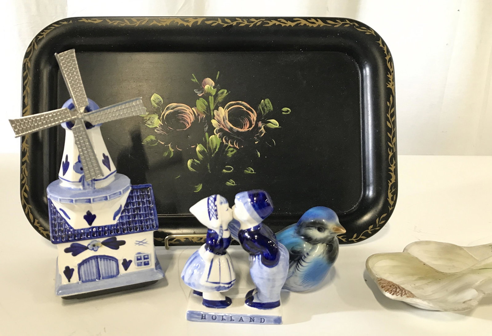 Lot 5 Collectible Tabletop Accessories and Decor: Pair Porcelain Holland Delft, Hand Painted Tray, more . Include an ELESVA Hand painted Windmill music box of classic Holland blue and white delft, Signed and Hallmarked ‘ Elevsa Holland 880’ windm