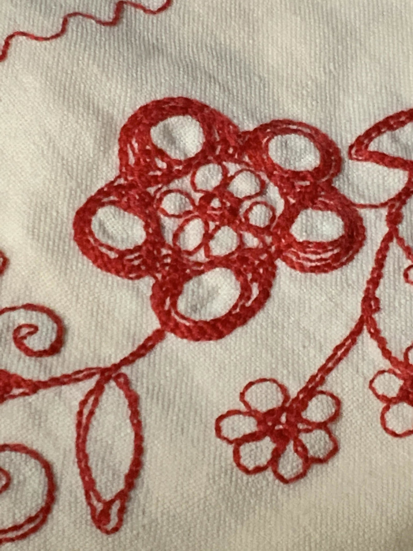 Pair Vintage Embroidered Decorative Textiles: Larger off-white linen textile hand embroidered with red floral designs. Table runner, upcycle craft. Some mild staining. Smaller handkerchief textile. Imprinted with 4 yellow birds around a blue squa