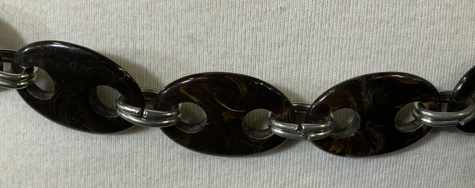 Composite Chain Link Belt: Composite chain link belt, no apparent inscriptions or stamps, silver and gold toned metal, faux stone design, measures 41 1/8 inches long, some tarnishing to metal but overall in good condition, Chai