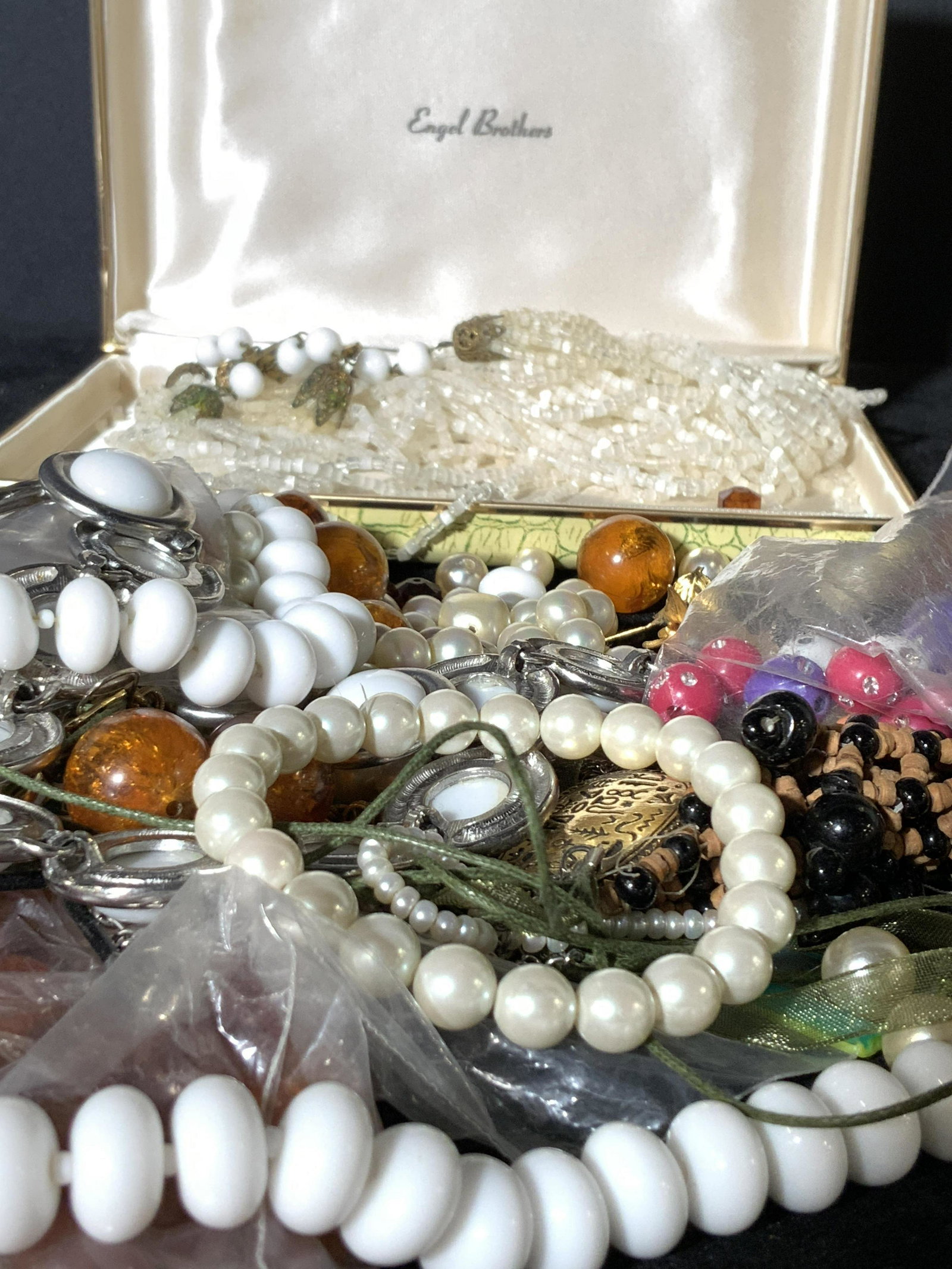 Group Lot Assorted Jewelry Pieces: Jewelry Makers lot, Large group lot of various beads, necklace strands, bracelets, and pieces of assorted jewelry. Various types of metals and beads. Up cycle craft project. One box in lot reads: Engl