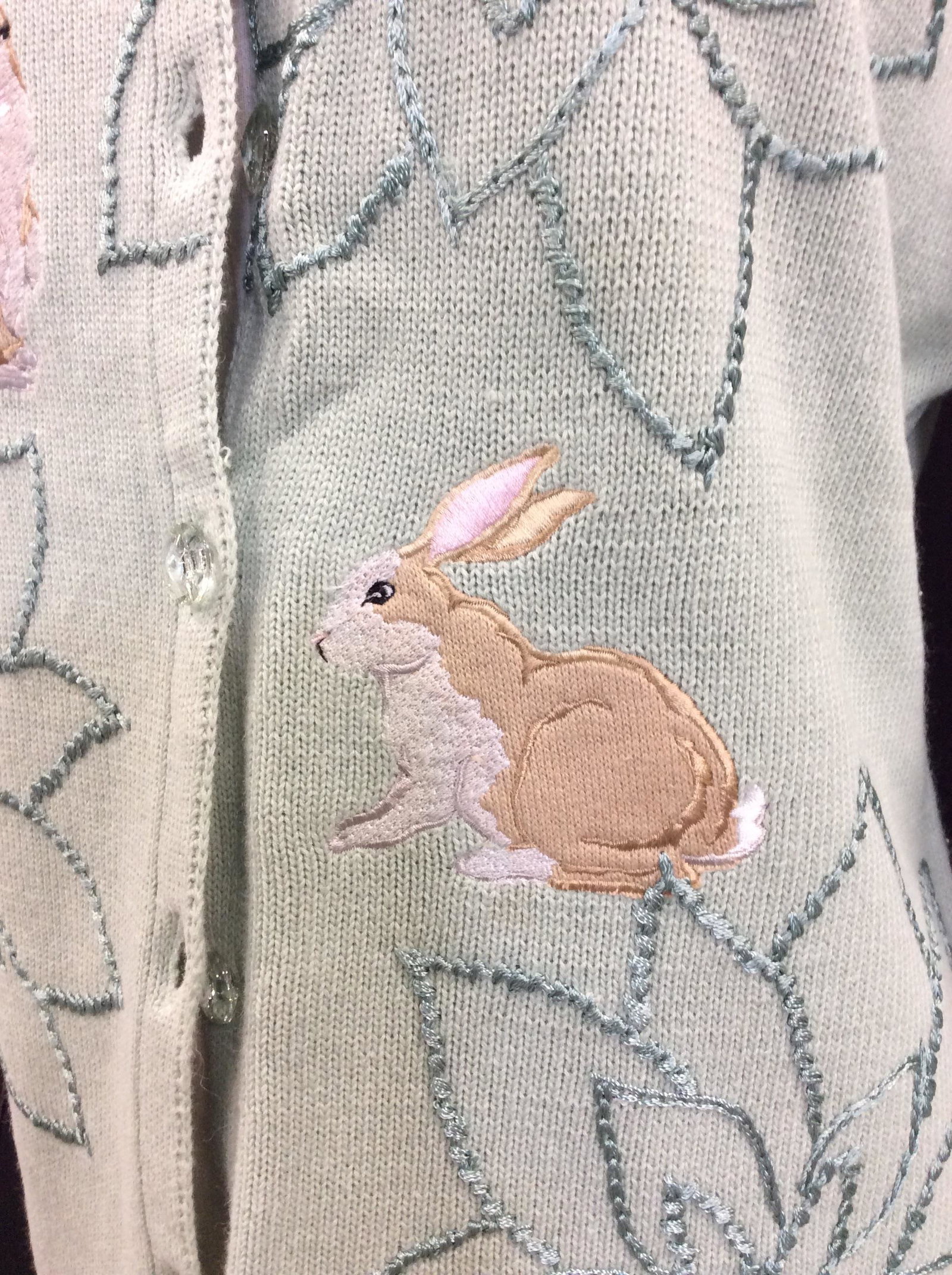Storybook Knits Cotton ‘Bunny’ Cardigan: Embroidered and Appliqué Button Down Sweater, Seafoam color with crystal style buttons. Size M. 45% Cotton, 55% ramie. Wild Rabbits face each other and flank buttoned center. Knitwear, Long Sleeve Sw