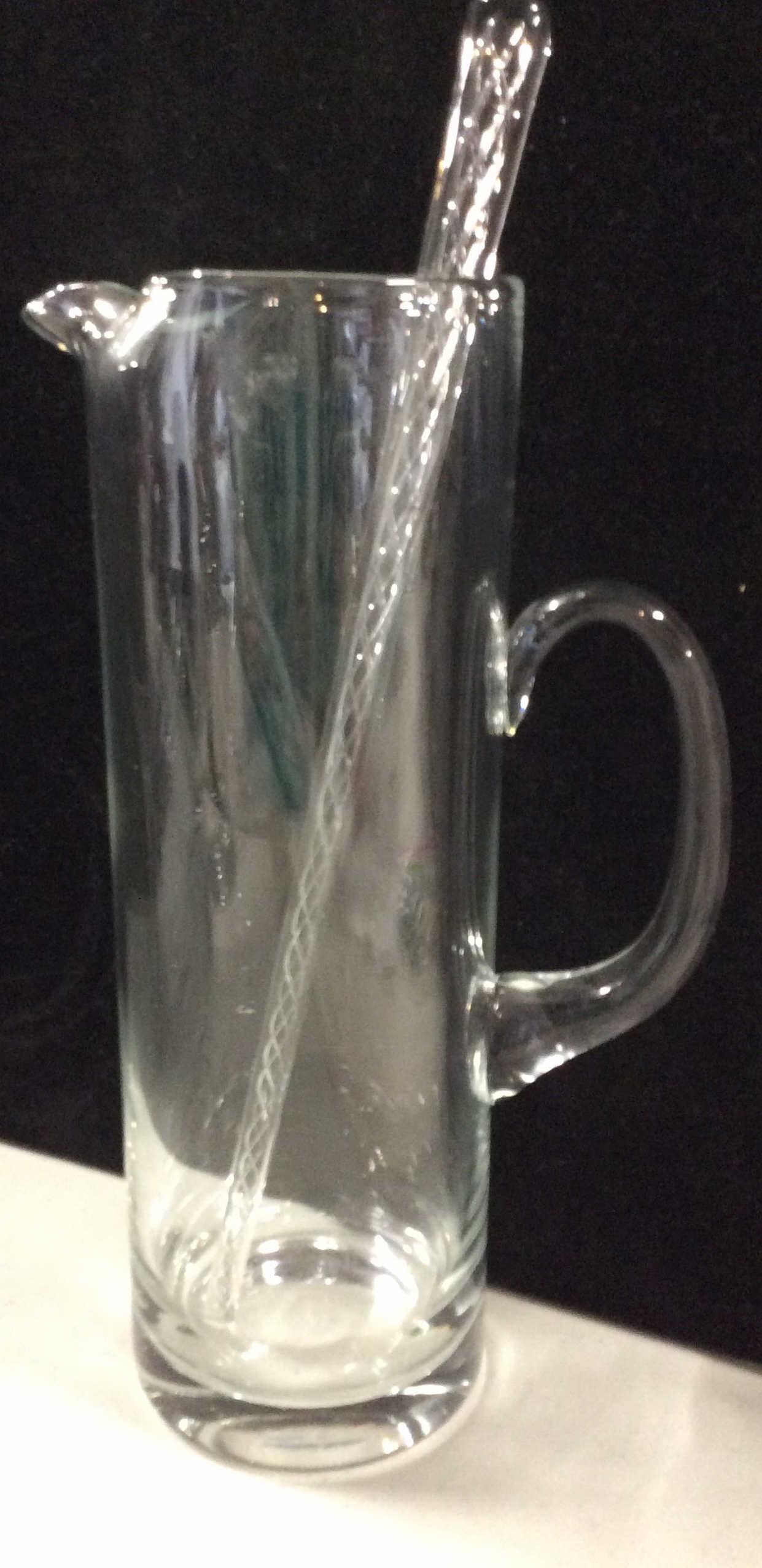 Glass Martini Set, Pitcher + Mixing Stick 8 pcs: 6 martini glasses, 6.5 in ht, diameter app 5 in. Twisted glass stem. 1 Serving Pitcher, app 11.5 in ht. Thick walled glass pitcher. Large Handle, spout that catches the bigger chunks of ice. 6 in widt